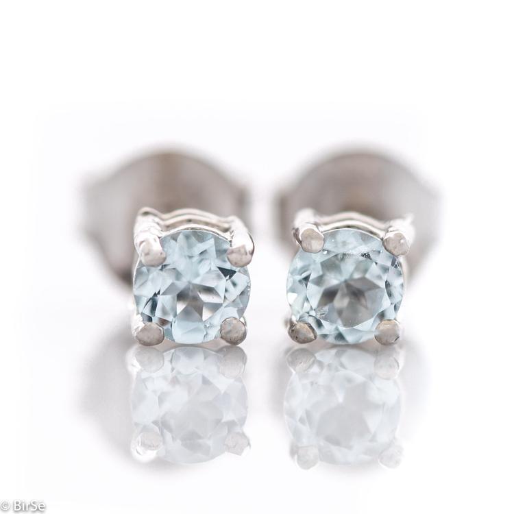 Silver earrings - 4x4 mm Natural blue topaz 0,60 ct.