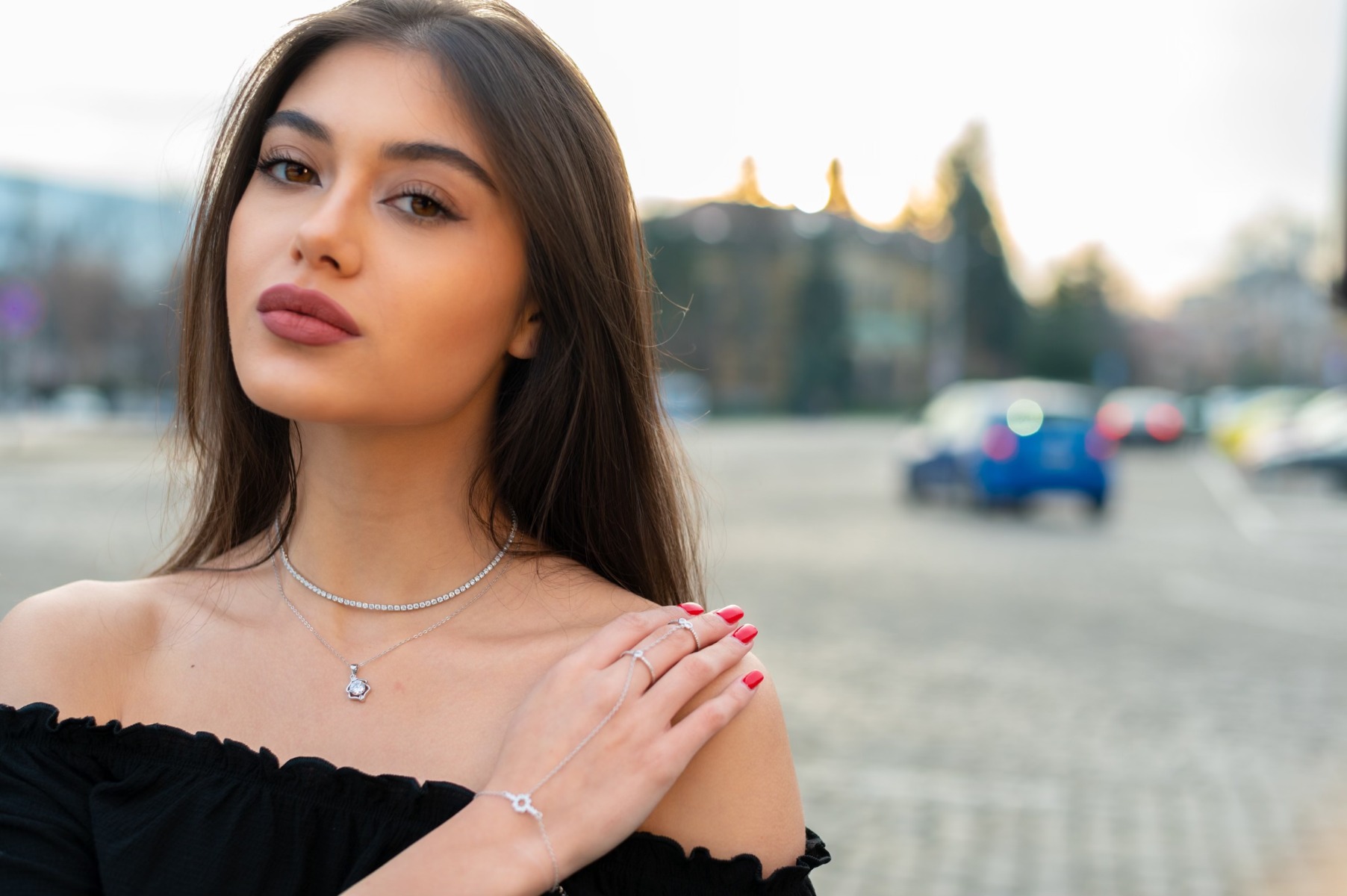 Stylish women's silver necklace, made entirely of rhodium-plated silver and covered with sparkling zircons. The necklace is an adjustable elevator type size, extremely convenient for formal outfits.