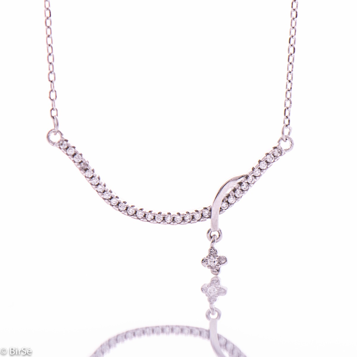 Tempting silver necklace with dangling elements. A great choice for the elegant yet bold ladies.