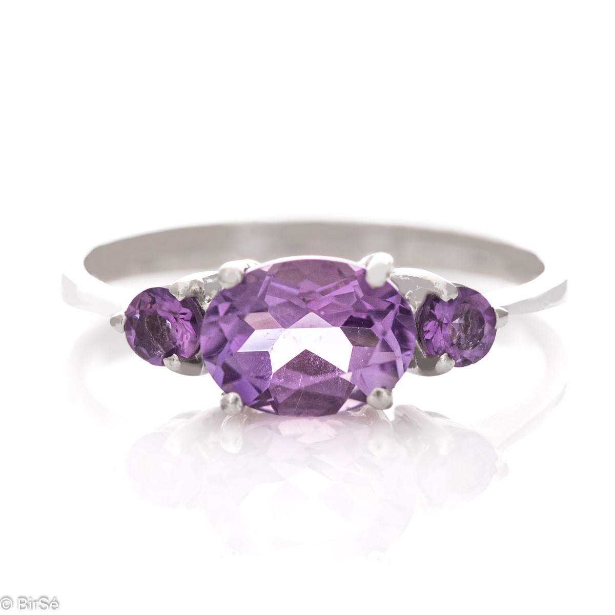 A stylish new offering for your jewelry collection. A ladies' ring made entirely of fine rhodium silver that gently envelops a magnetic amethyst.