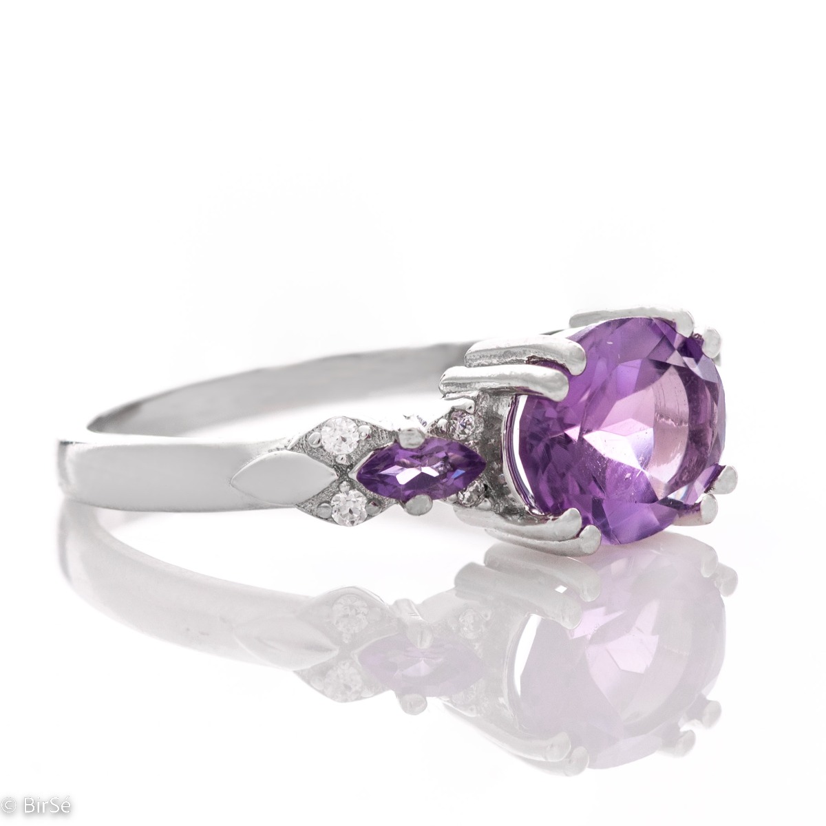 Temptation in violet - an exquisite silver ring with a natural amethyst that will raise your self-esteem deservedly. Part of a charming English clasp pendant and earring set.