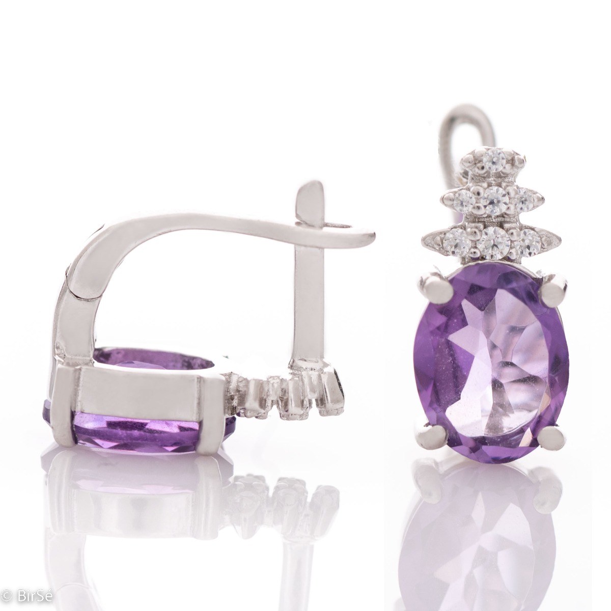 Exquisite ladies' English clasp earrings delicately crafted entirely from rhodium-plated silver, combined with captivating natural amethyst and sparkling zircons. They can be combined with a ring and pendant of the same model.