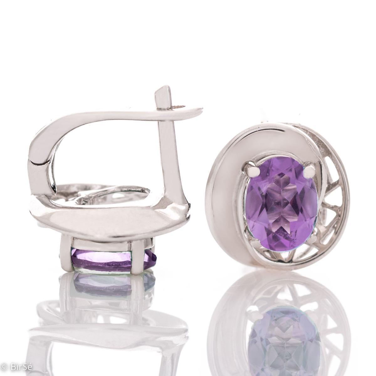 Stunning ladies earrings finely crafted from natural amethyst and rhodium silver. Their magic is enhanced with a pendant and ring from the same collection and the same indescribable design.