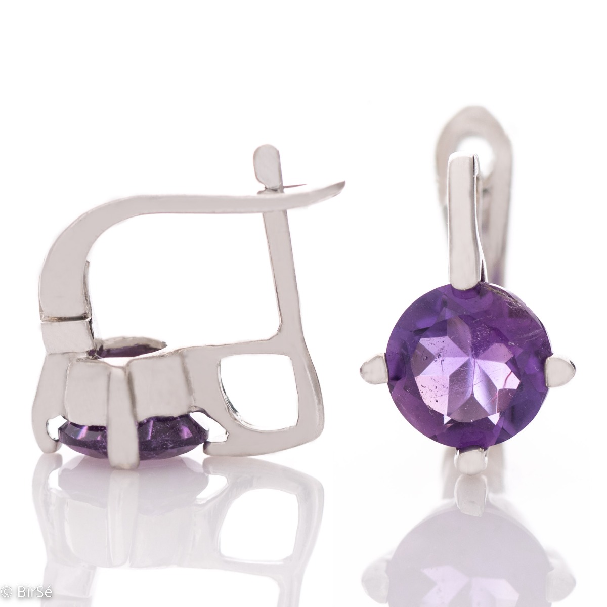 Delicate earrings simple design and radiant natural amethyst. They are made entirely of beautiful rhodium silver with a comfortable English clasp. A spectacular ring and pendant complete the set.