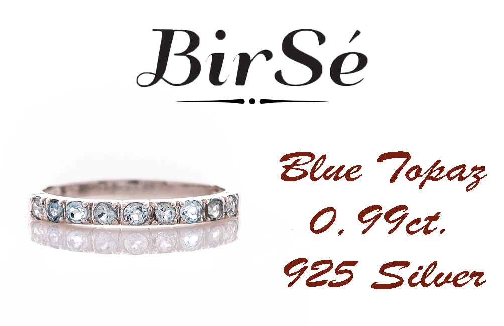 A dazzling ring of beautiful rhodium-plated sterling silver and a row of lovely sky blue topazes.