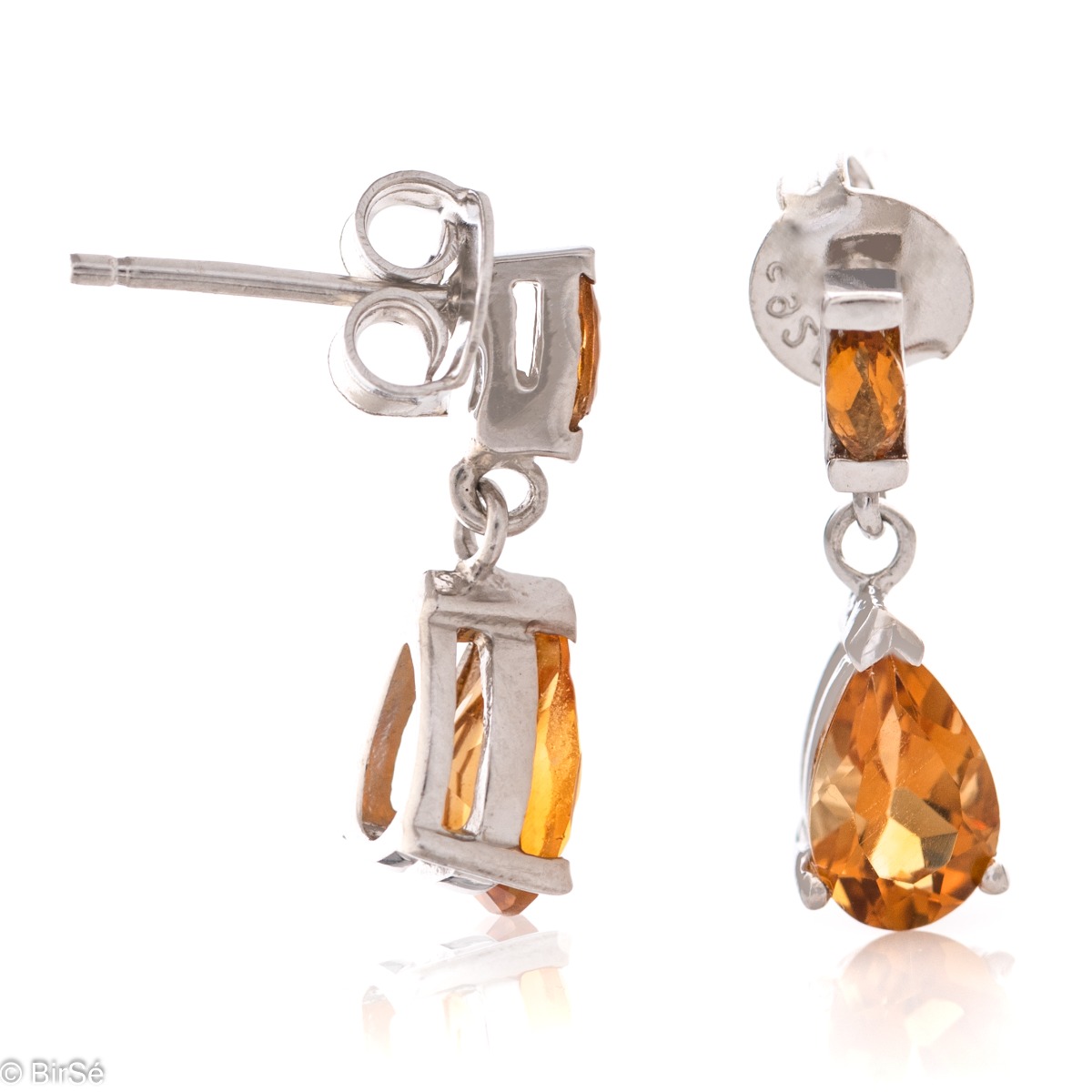 Delicately elegant silver earrings with a spectacular look and fastening with a pin. Stylish compositional design of the elements from a fine combination of rhodium-plated silver with a drop of golden citrine. Part of a set with a ring in the same gold lu