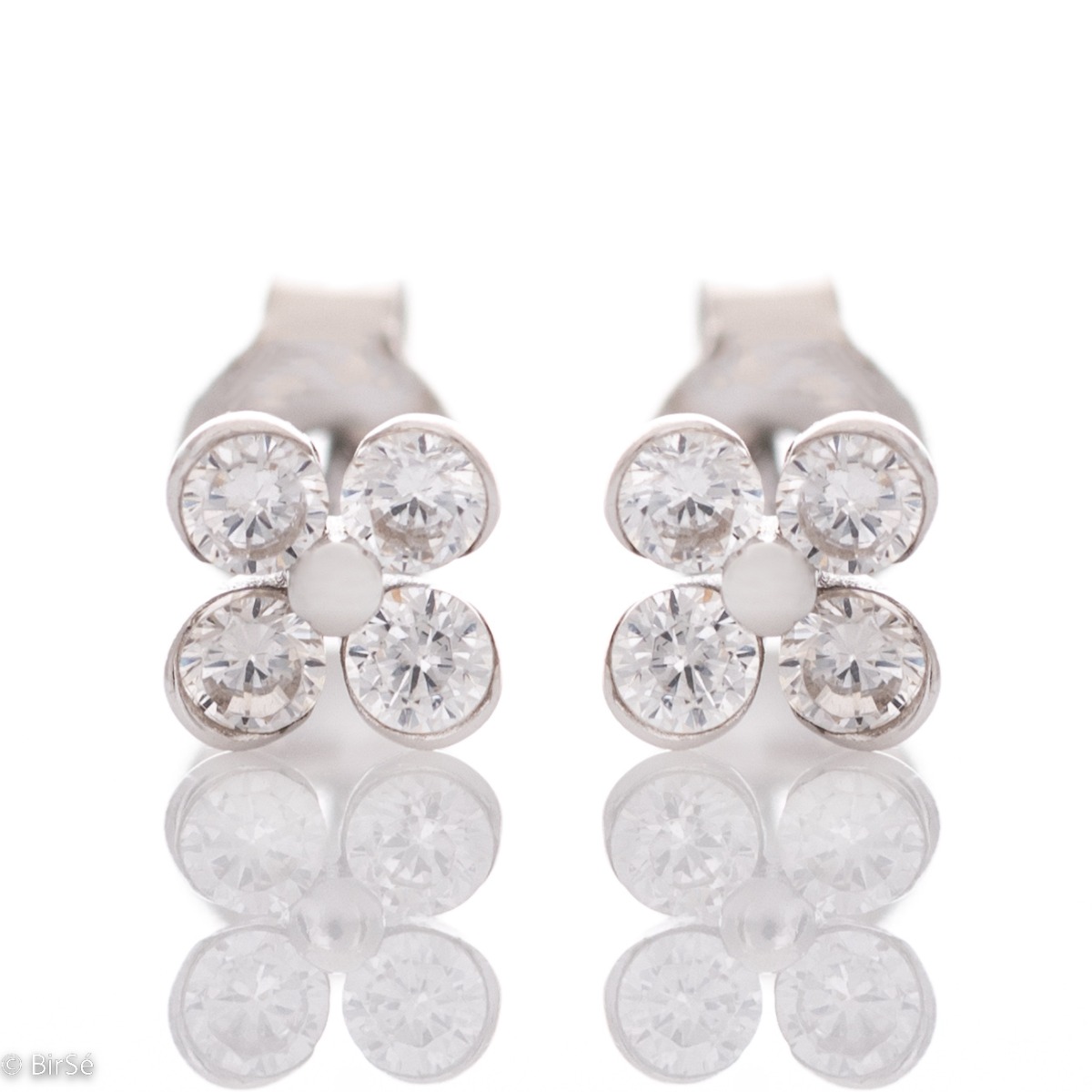 Captivating women's floral style earrings made of soft silver, elegantly combined with dazzling zircons. The fastening is with a pin for more comfort, so they are also suitable for little girls.