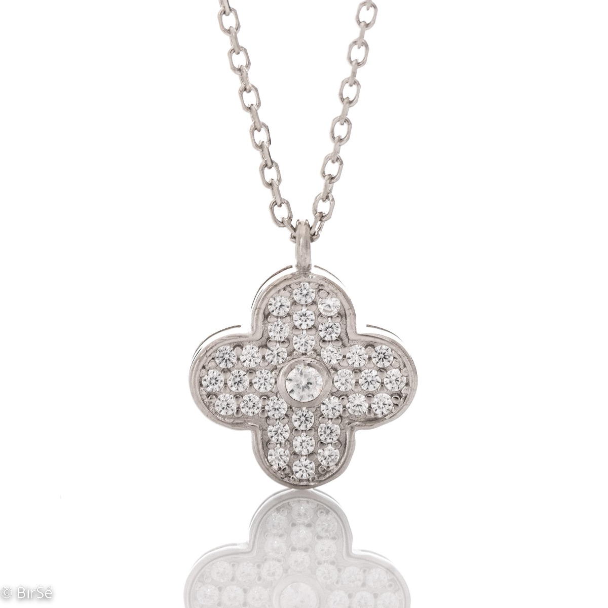 Elegant women's necklace with a modern design made of rhodium silver. The jewelry has a captivating craftsmanship - a delicate chain of classic braid, which carries a glittering flower of dazzling zircons.