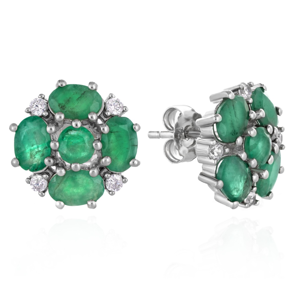 Charming earrings crafted from fine rhodium silver and a radiant natural emerald arranged in a flower shape. Our new stud earrings are part of a charming ring and pendant set.