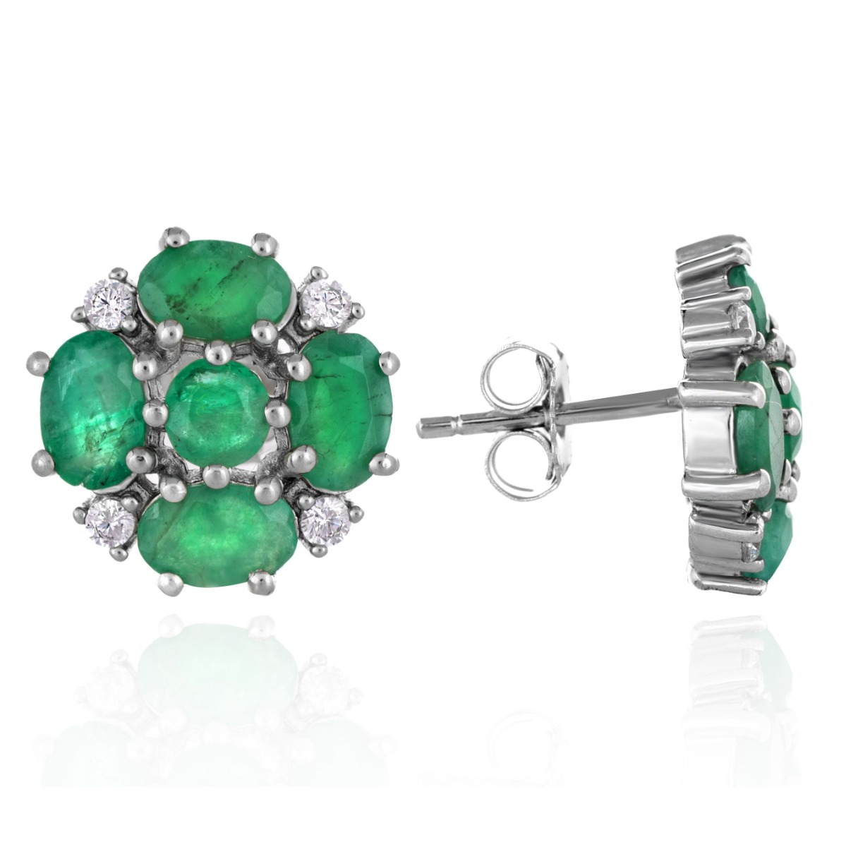 Charming earrings crafted from fine rhodium silver and a radiant natural emerald arranged in a flower shape. Our new stud earrings are part of a charming ring and pendant set.