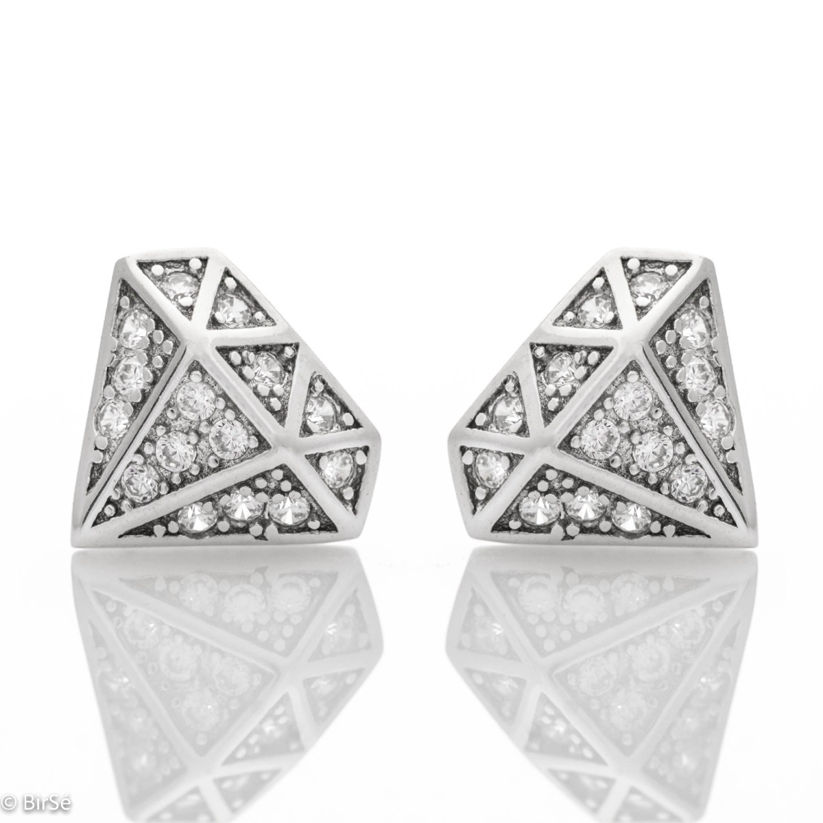 Stylish women's earrings with a modern diamond design, made entirely of soft rhodium silver and sparkling zircons, with a convenient pin fastening for your everyday life. A suitable gift for any occasion.