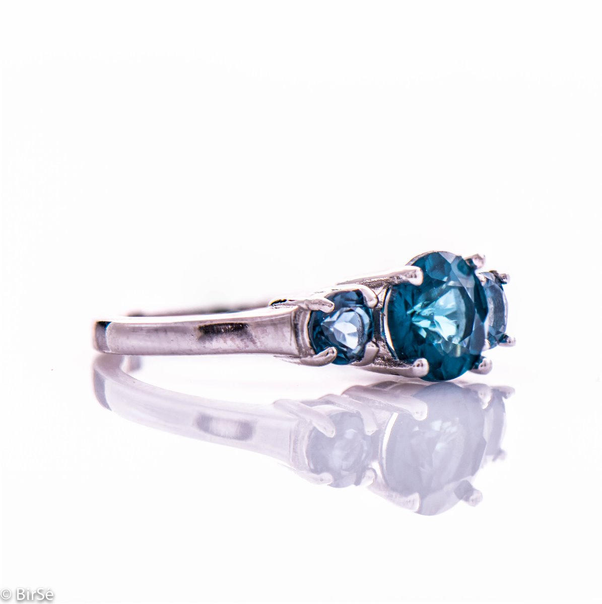 Silver Solitaire Ring with Natural London topaz