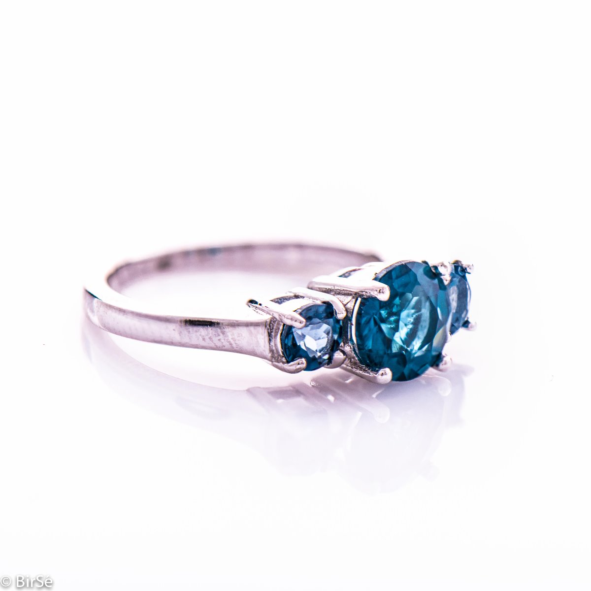 Silver Solitaire Ring with Natural London topaz