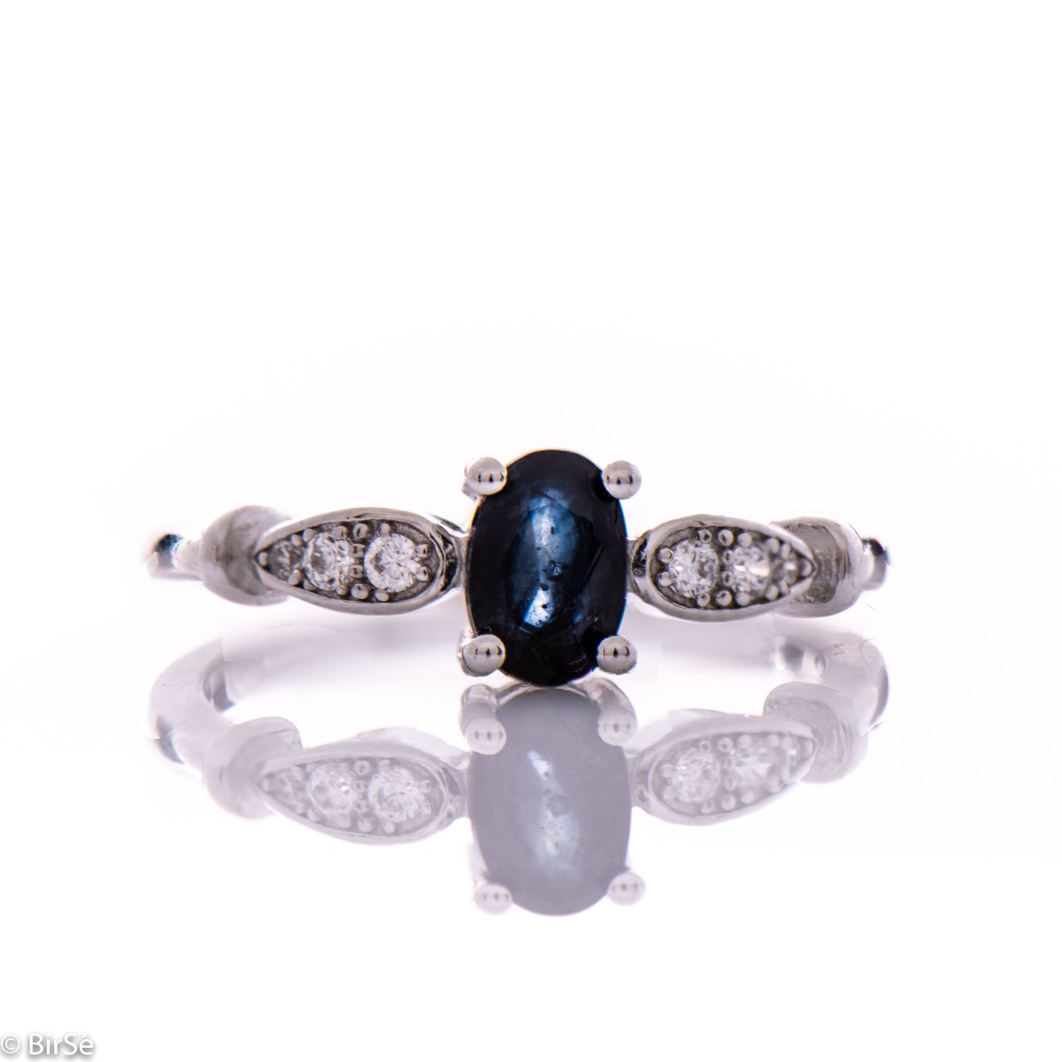 Captivating Silver Ring with Natural Sapphire and Tender Zircons