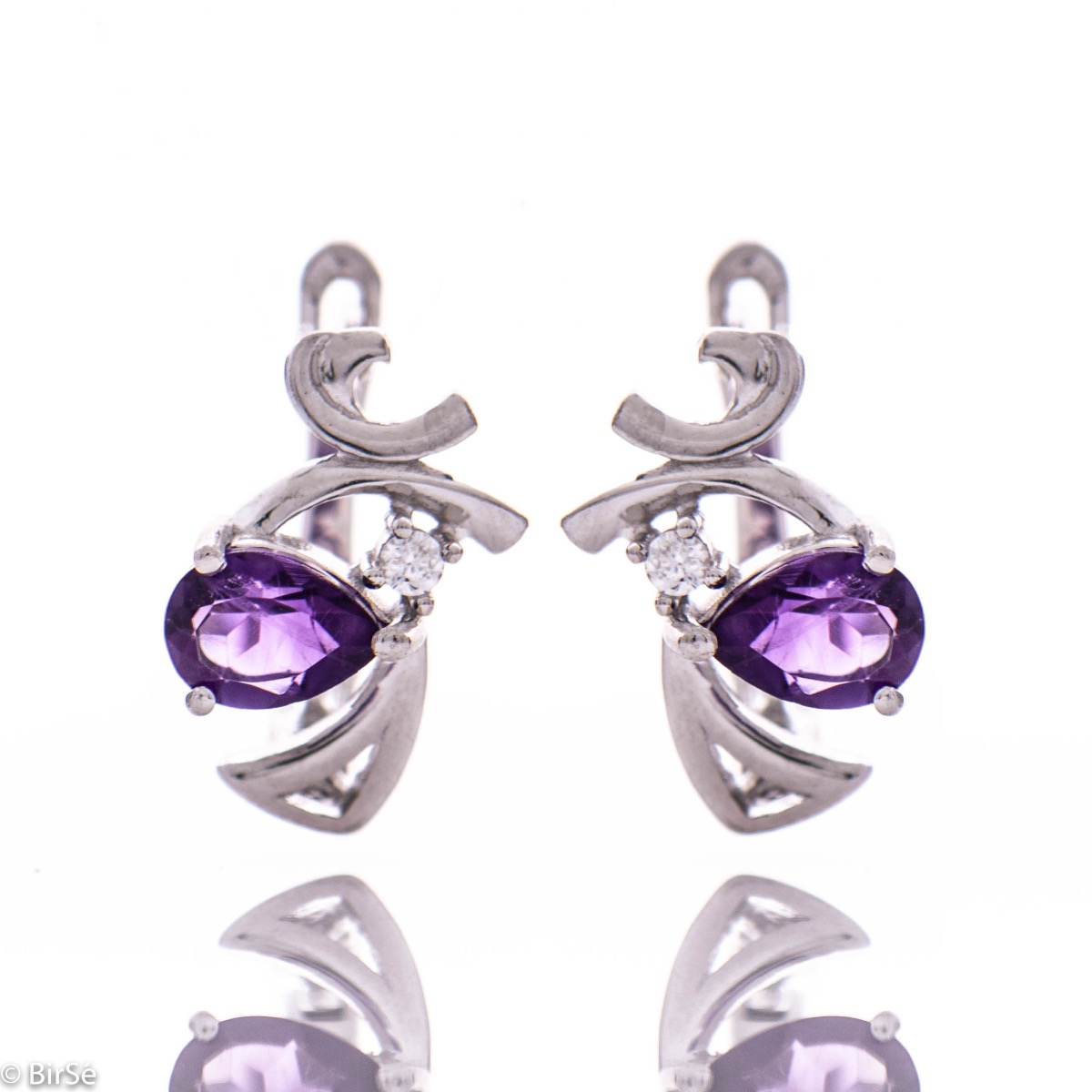 Captivating women's earrings with an English clasp and a modern design of the detail, interweaving a radiant natural amethyst stone with a delicate zircon and crafted in beautiful rhodium silver. In an exclusive ring and pendant set.