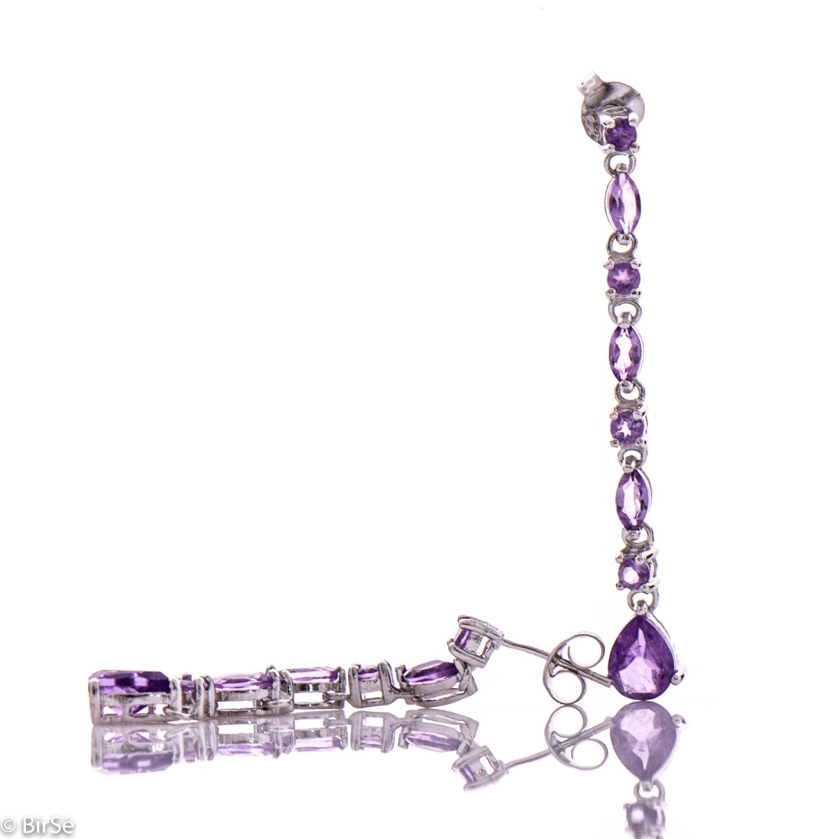 Captivating dangling silver stud earrings with colorful glow of numerous and delicate natural amethyst stones, complemented by fine craftsmanship in beautiful rhodium silver.