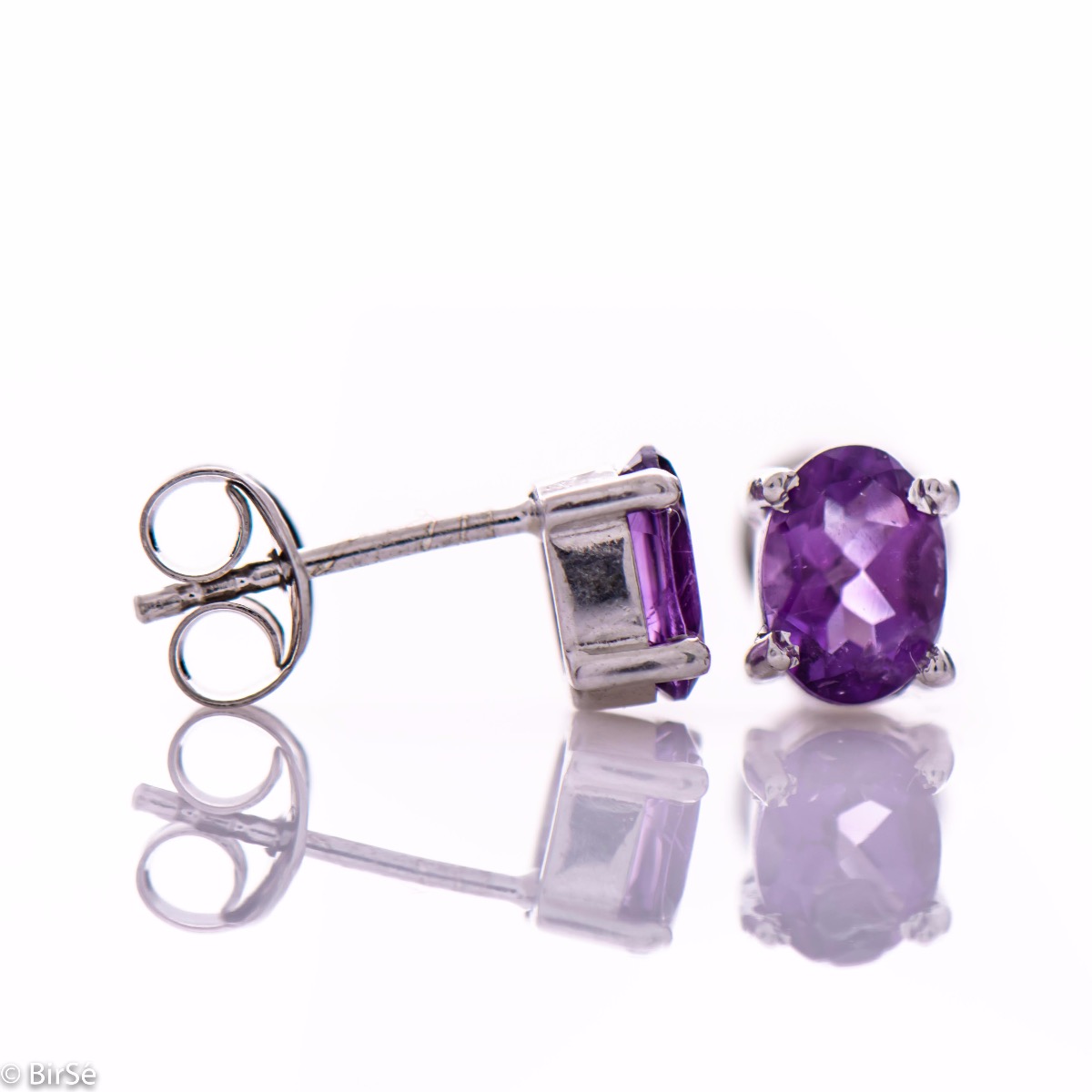 Exquisite stud earrings with a delicate combination of rhodium silver and radiant natural amethyst.