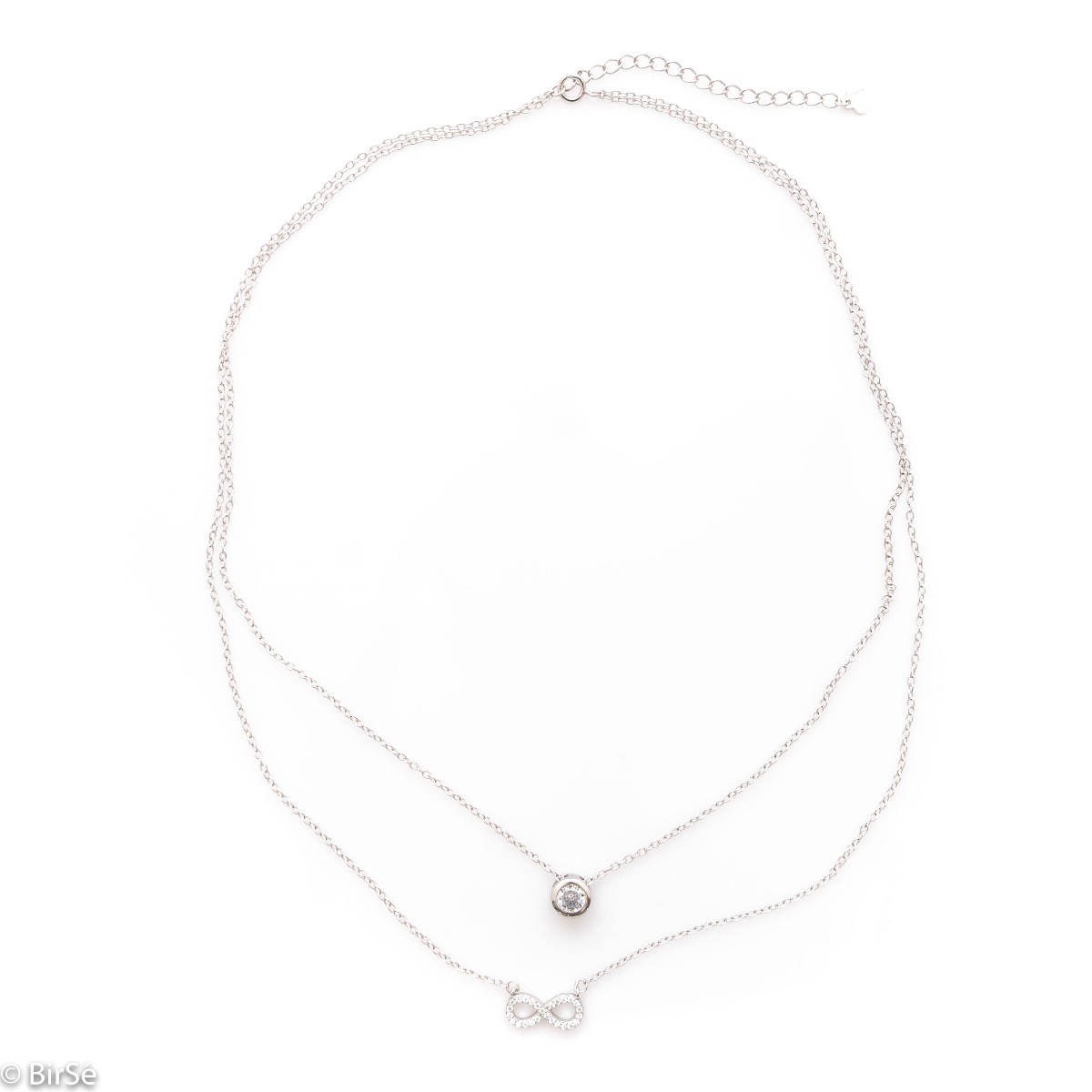 A double silver necklace with a spectacular design entirely of rhodium-plated silver and two delicate elements of a dazzling infinity and a central zircon.