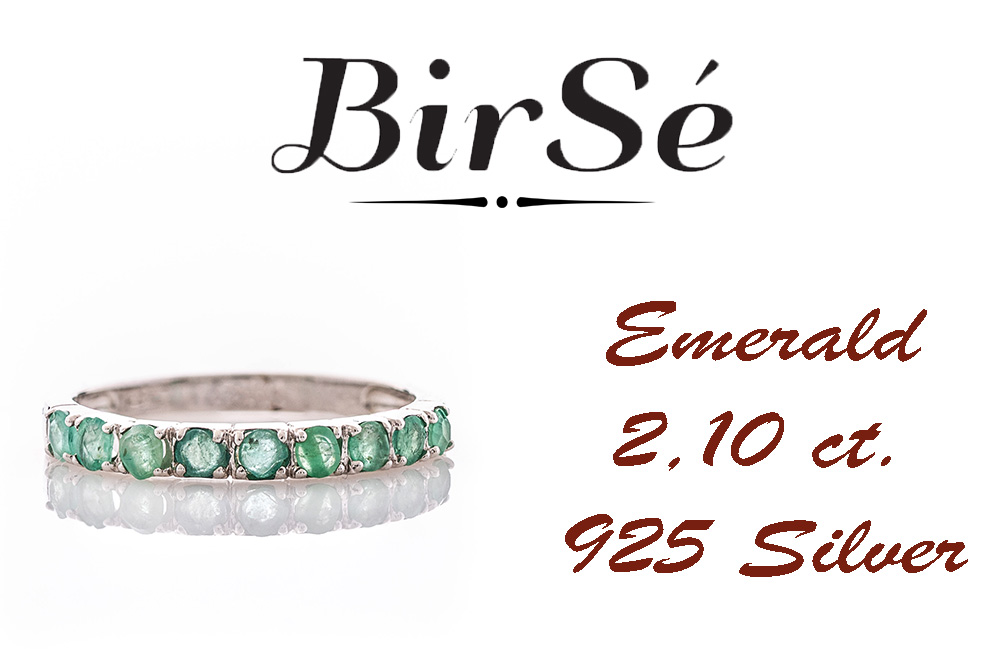 Finely crafted fine rhodium silver women's ring with a row of charming natural emeralds.