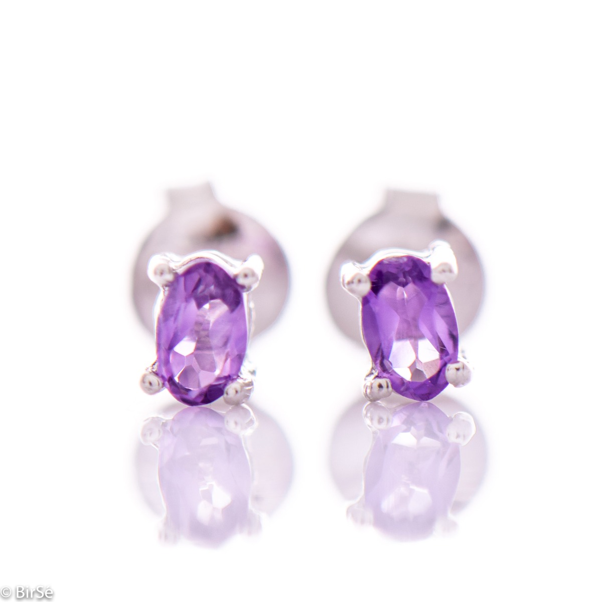 Spectacular and glamorous natural amethyst complemented by delicate rhodium silver - our new offer silver stud earrings.