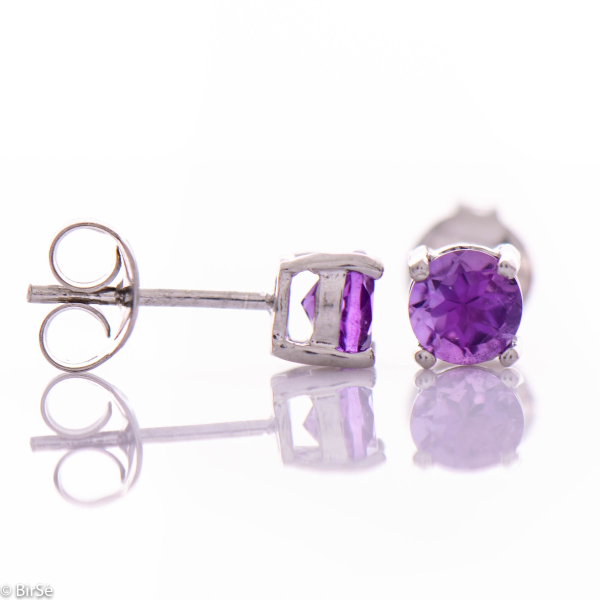 Gentle glow of natural amethyst stone combined with rhodium silver - our new stud earrings with purple luster and beautiful craftsmanship.