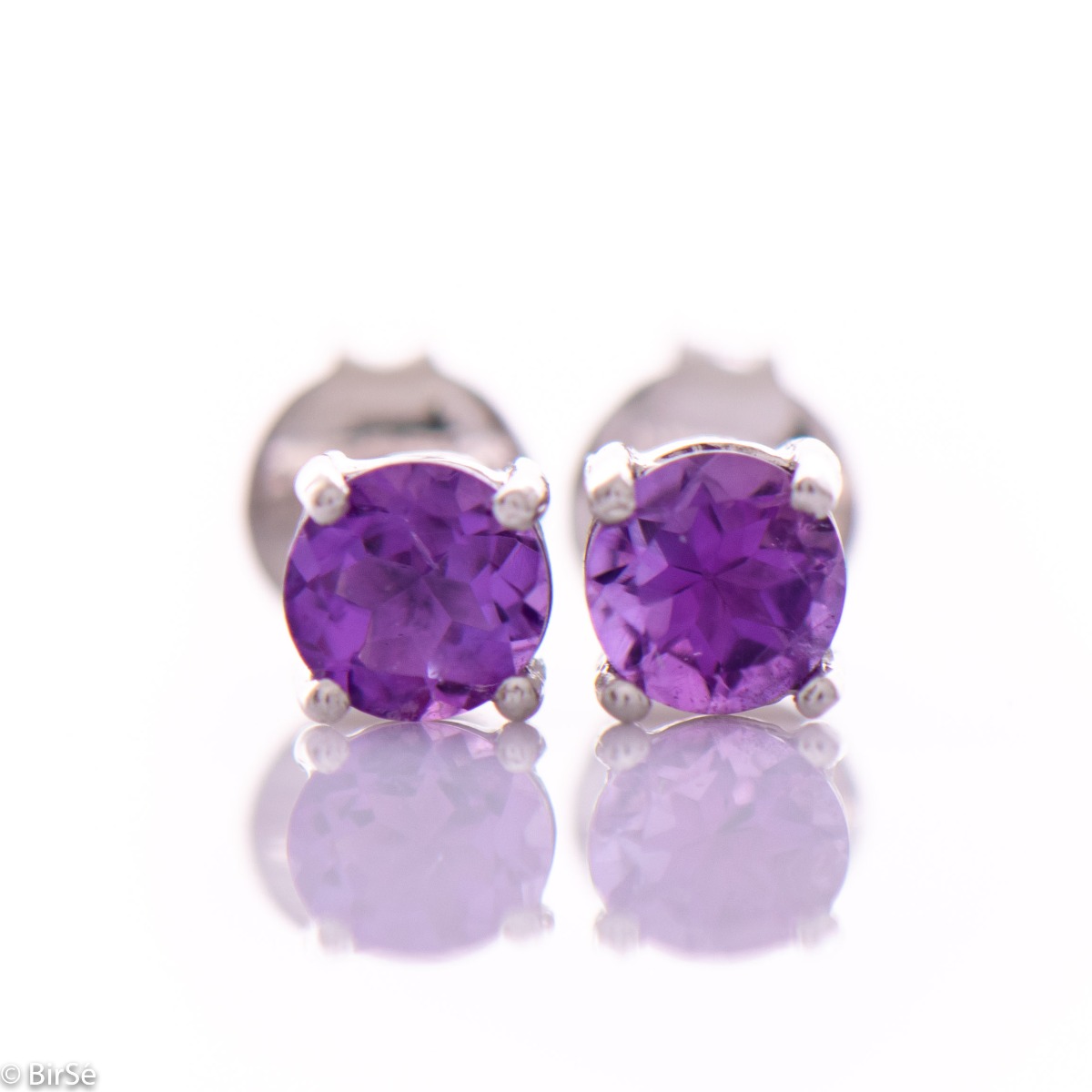 Gentle glow of natural amethyst stone combined with rhodium silver - our new stud earrings with purple luster and beautiful craftsmanship.