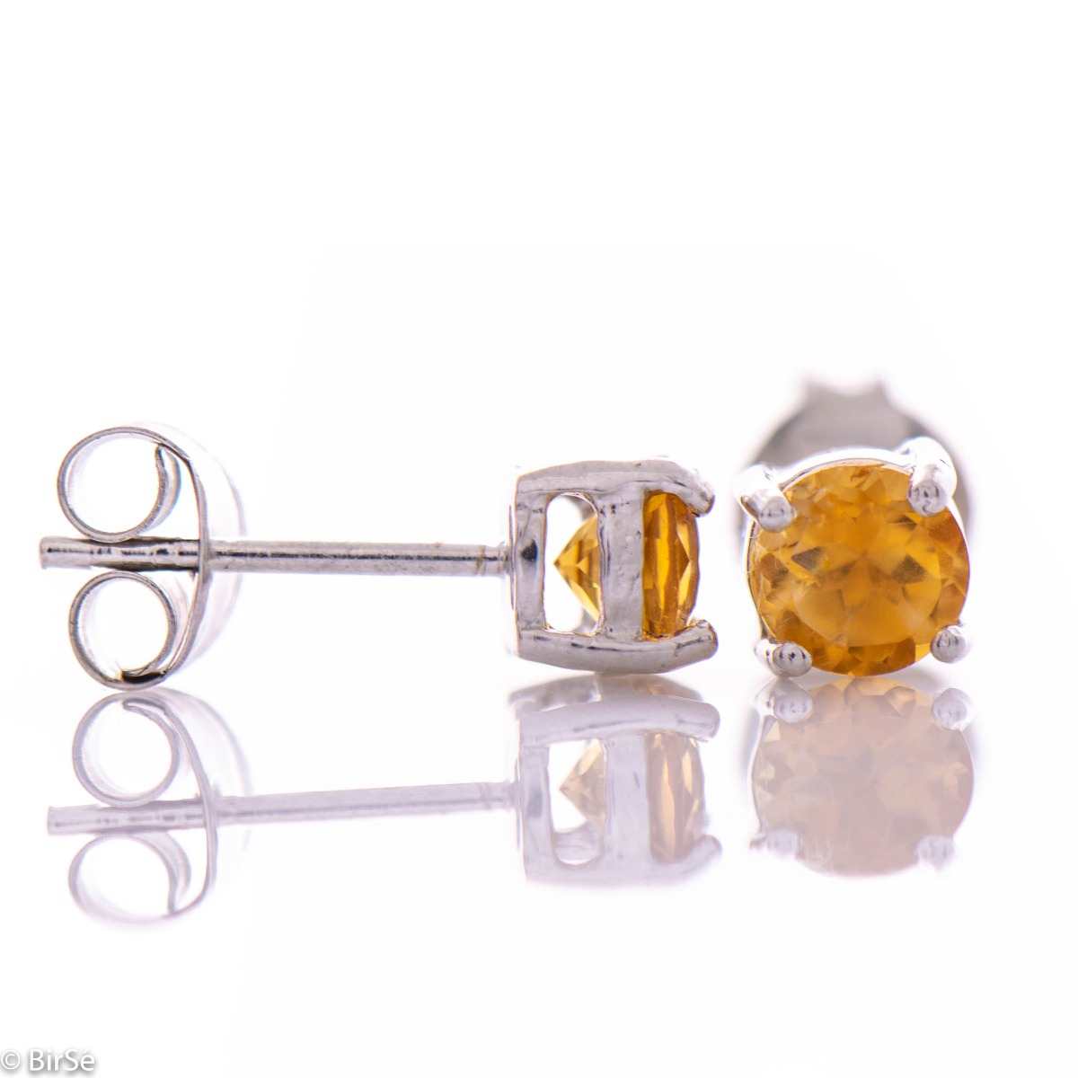 A colorful glow of natural citrine stone with delicate rhodium silver - our new stud earrings.