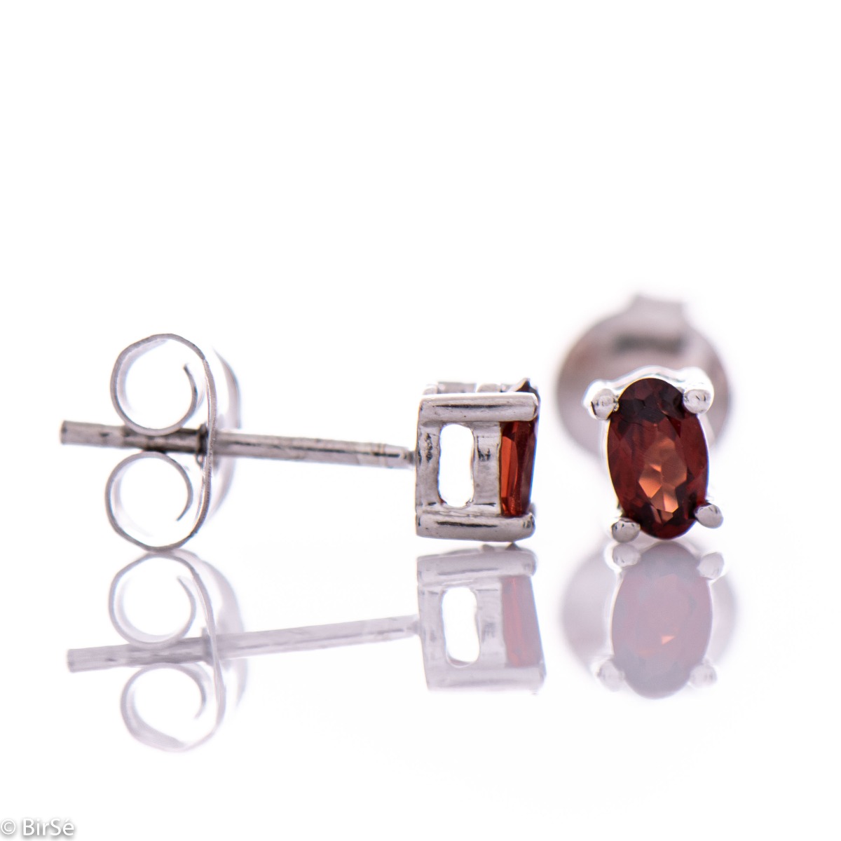 Spectacular and charming natural garnet stone combined with delicate rhodium silver - our new stud earrings suitable for any occasion.