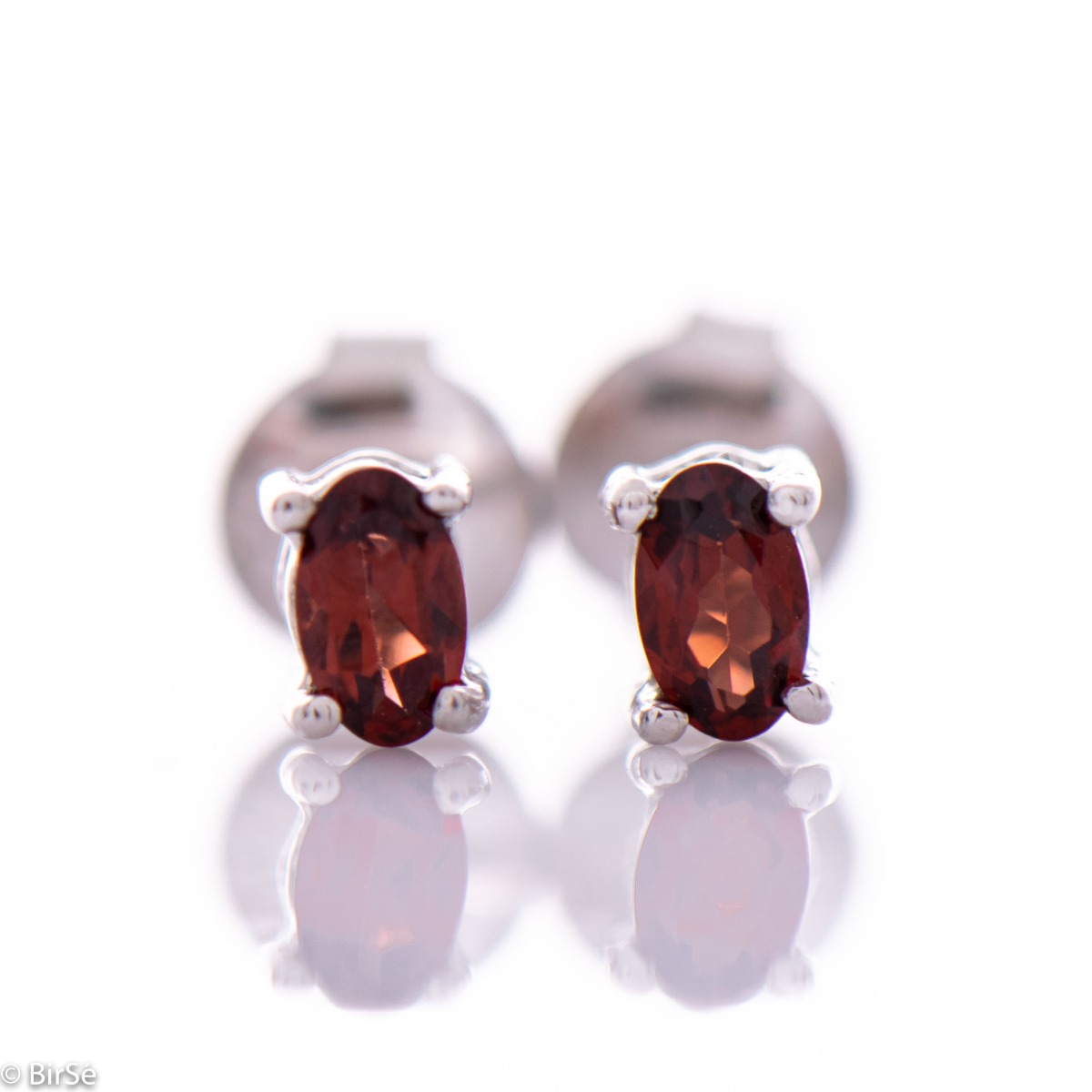 Spectacular and charming natural garnet stone combined with delicate rhodium silver - our new stud earrings suitable for any occasion.