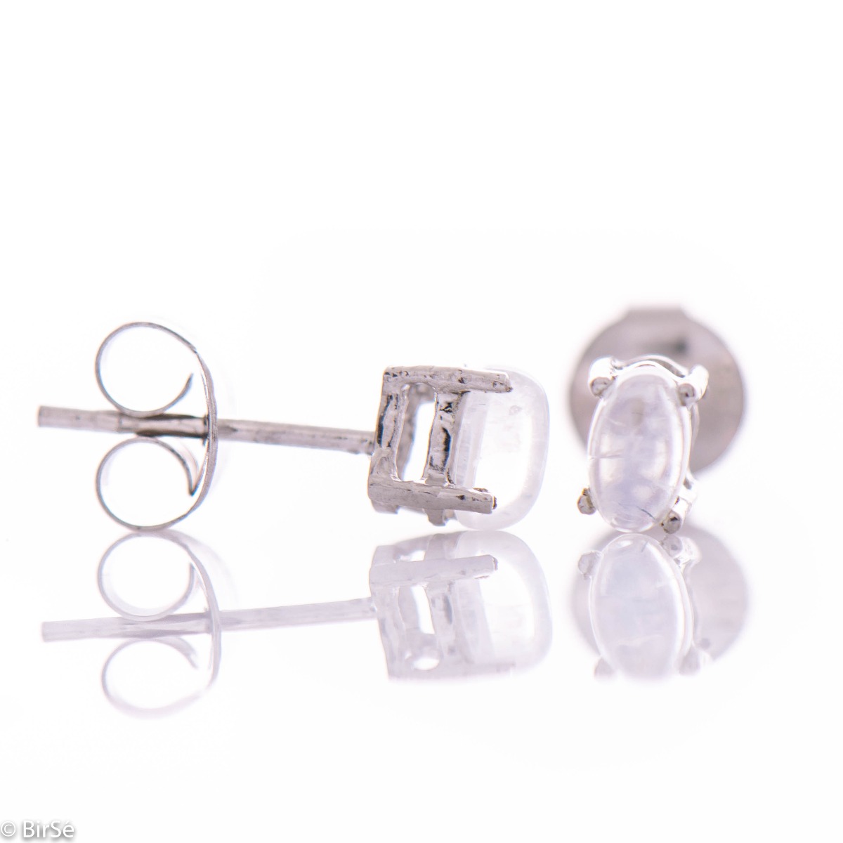 White glow of natural moonstone intertwined with delicate rhodium silver - our new fine stud earrings 5x3 mm.