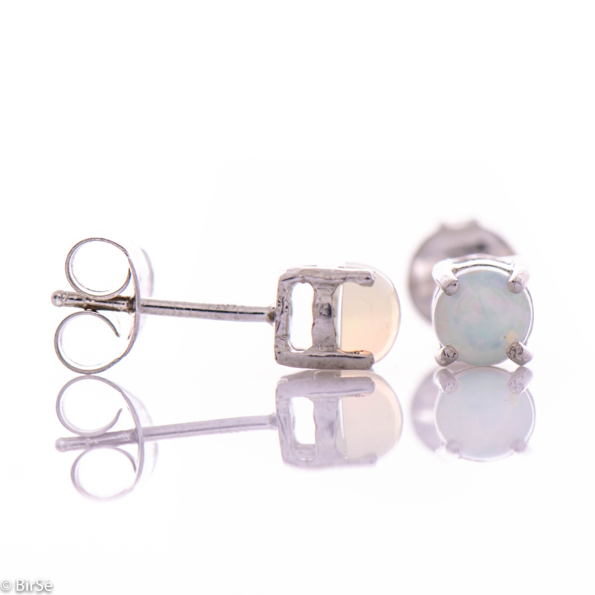 Spectacular and beautiful stud earrings with delicate rhodium silver combined with multi-colored and radiant natural stone opal.