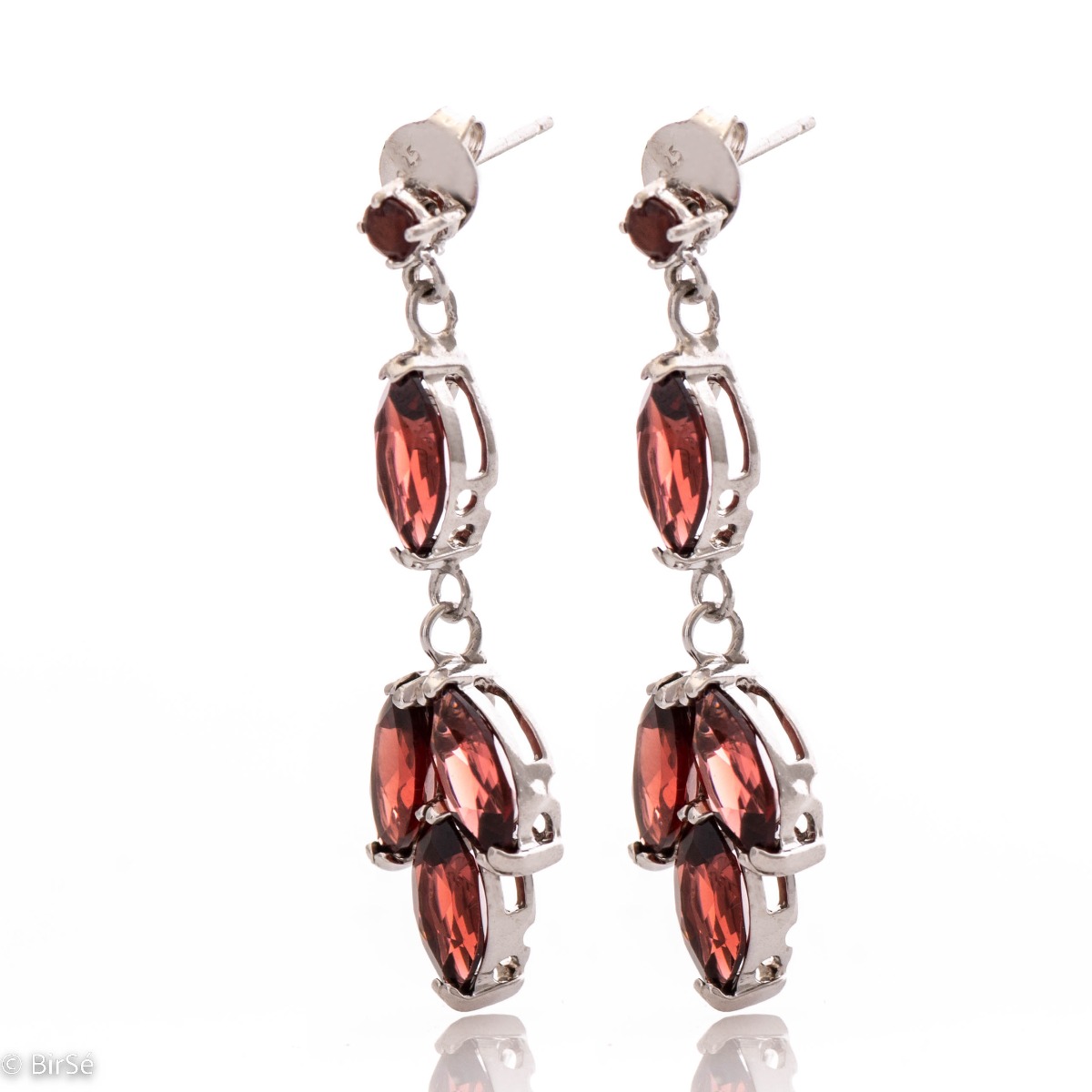 Magnetic earrings made of rhodium silver and enchanted garnet - magic that suits every lady.