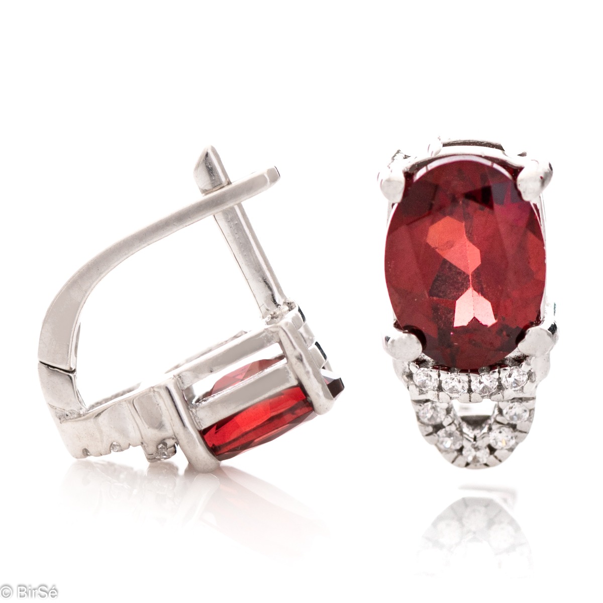 Elegant women's earrings with English clasp and precision craftsmanship entirely of rhodium-plated silver, combined with radiant natural garnet and sparkling zircons. They can be combined with a ring and pendant of the same model.