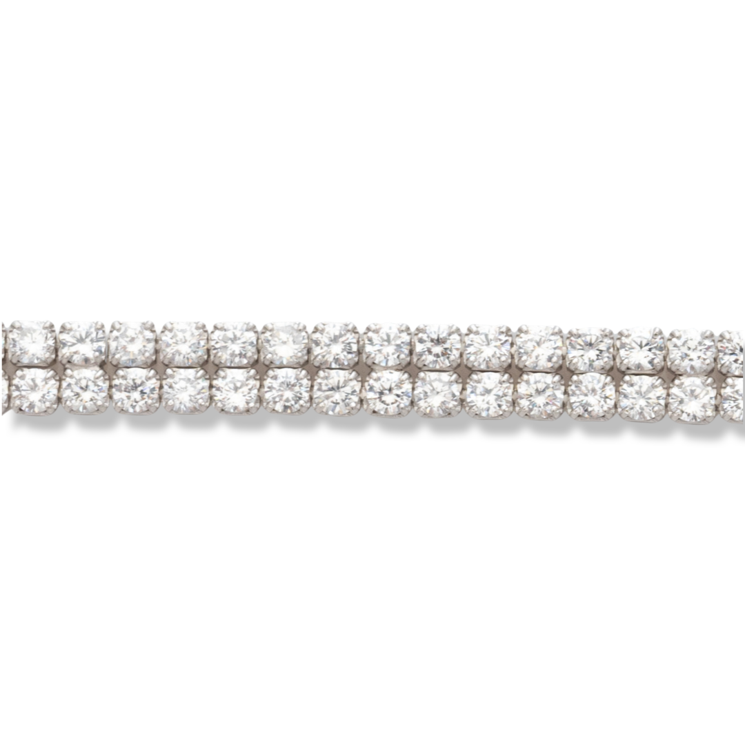 Ethereal women's jewelry made of soft silver with exquisite craftsmanship in two rows of sparkling zircons. The fine women's bracelet has an extension, for more convenience when adjusting the length. Royal Perfection by BirSe for your special moments.