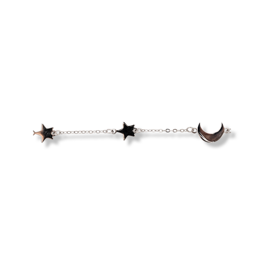 Exquisitely crafted women's bracelet, with elegantly shaped rhodium-plated silver moons and stars. Present the moon and stars to your beloved and see the pleasure in her eyes. A suitable gift for any occasion.