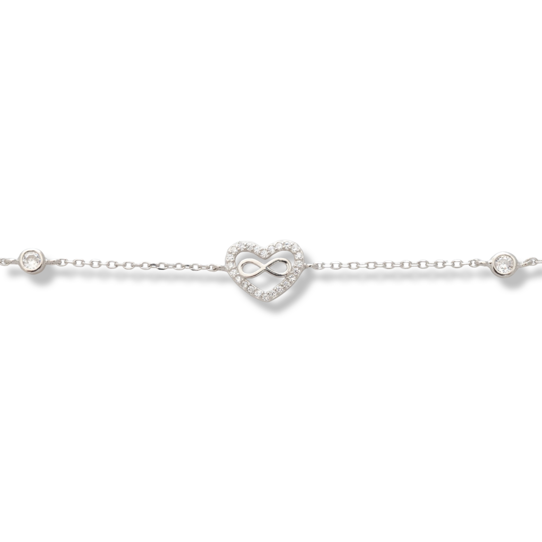 Charming women's bracelet in soft silver with an exquisitely crafted heart encrusted with sparkling zircons. A subtle infinity elegantly complements the heart. The bracelet has an extension, for more convenience when adjusting the length. A new offer from