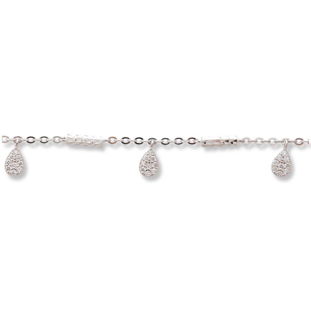 Elegantly made women's bracelet with beautifully shaped drops - pendants made of silver and zircons. The pendants are separated by dainty diamond studs strung on a fine rhodium silver chain. The bracelet is a beautiful gift for your girl to shine every da