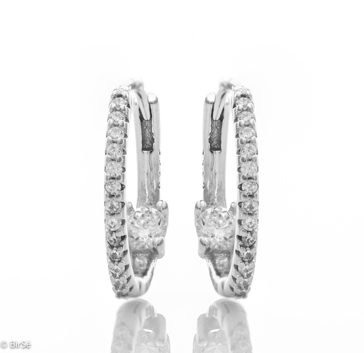 Exquisite women's hoop earrings, made with an elegant design entirely of rhodium-plated silver and dazzling zircons. Willow fastening is comfortable and practical, preferred by ladies.