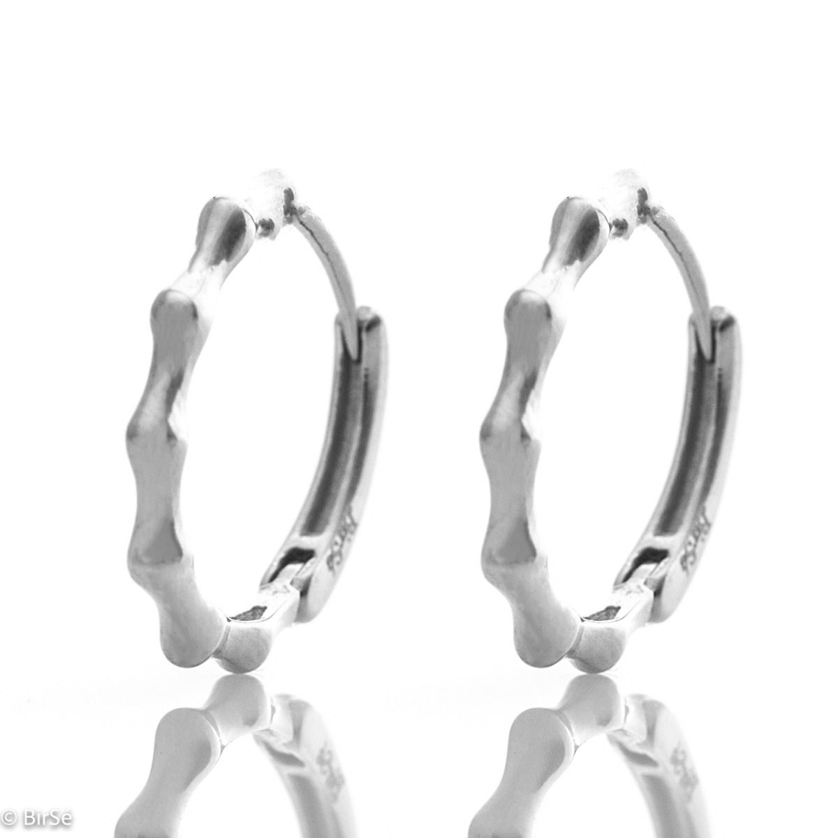 Fine women's hoop earrings, made entirely of rhodium-plated silver, with an elegant design. Willow fastening is comfortable and practical, preferred by ladies.