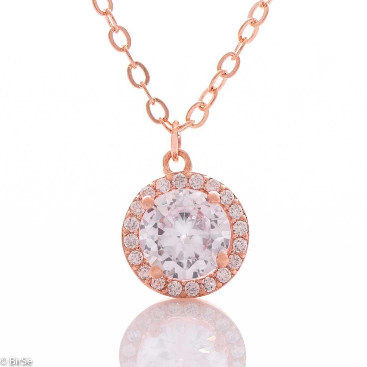 A simple sophisticated necklace made of rhodium-plated rose silver and a beautiful shiny zircon, beautifully surrounded by many tiny zircons. It is suitable for ladies who like clean lines in jewelry. It can be combined with earrings and rings with zircon