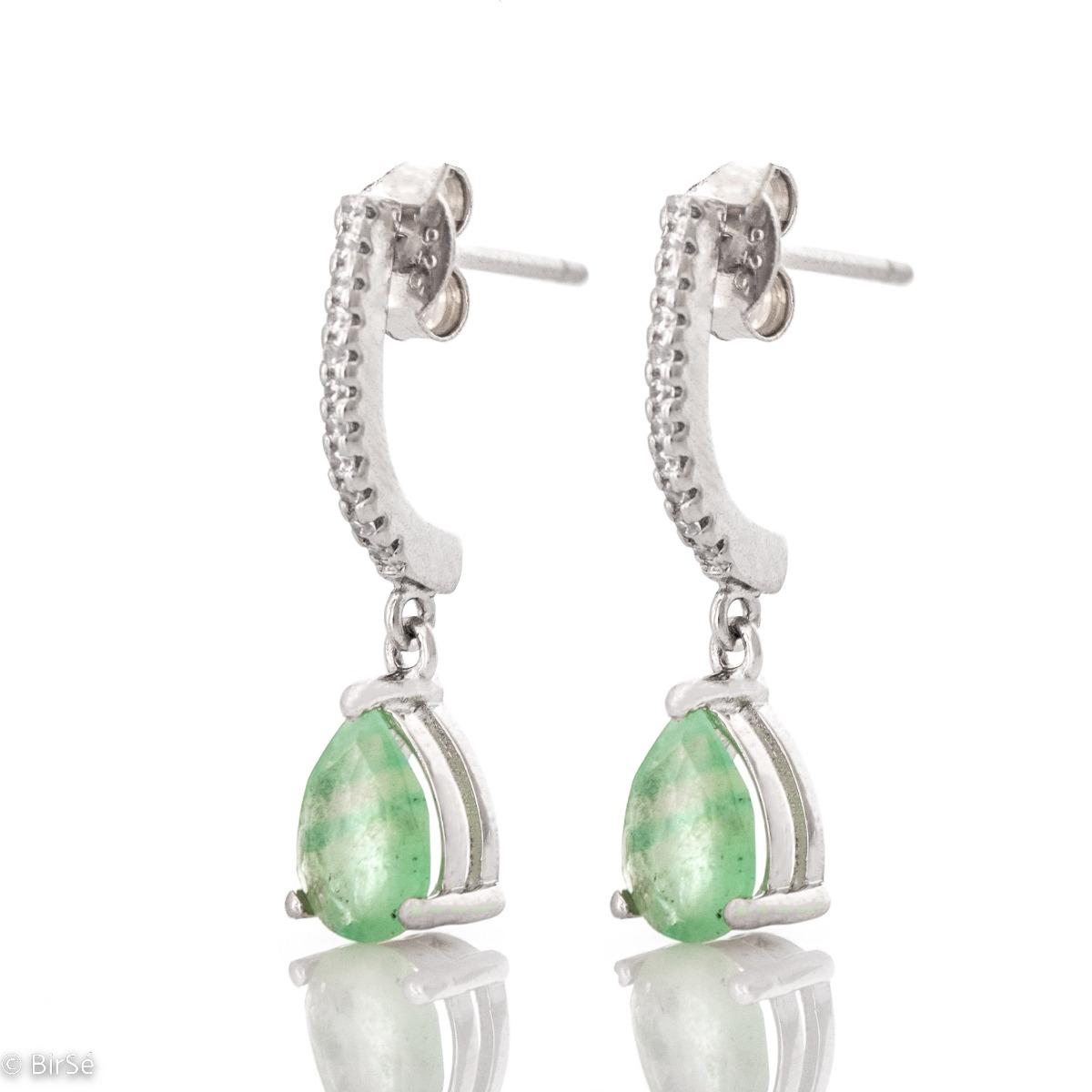 Add a dash of glamor to your earring choices with this stunning pair of rhodium silver and natural emerald. The earrings are dangling and will make your face even more shiny and charming.