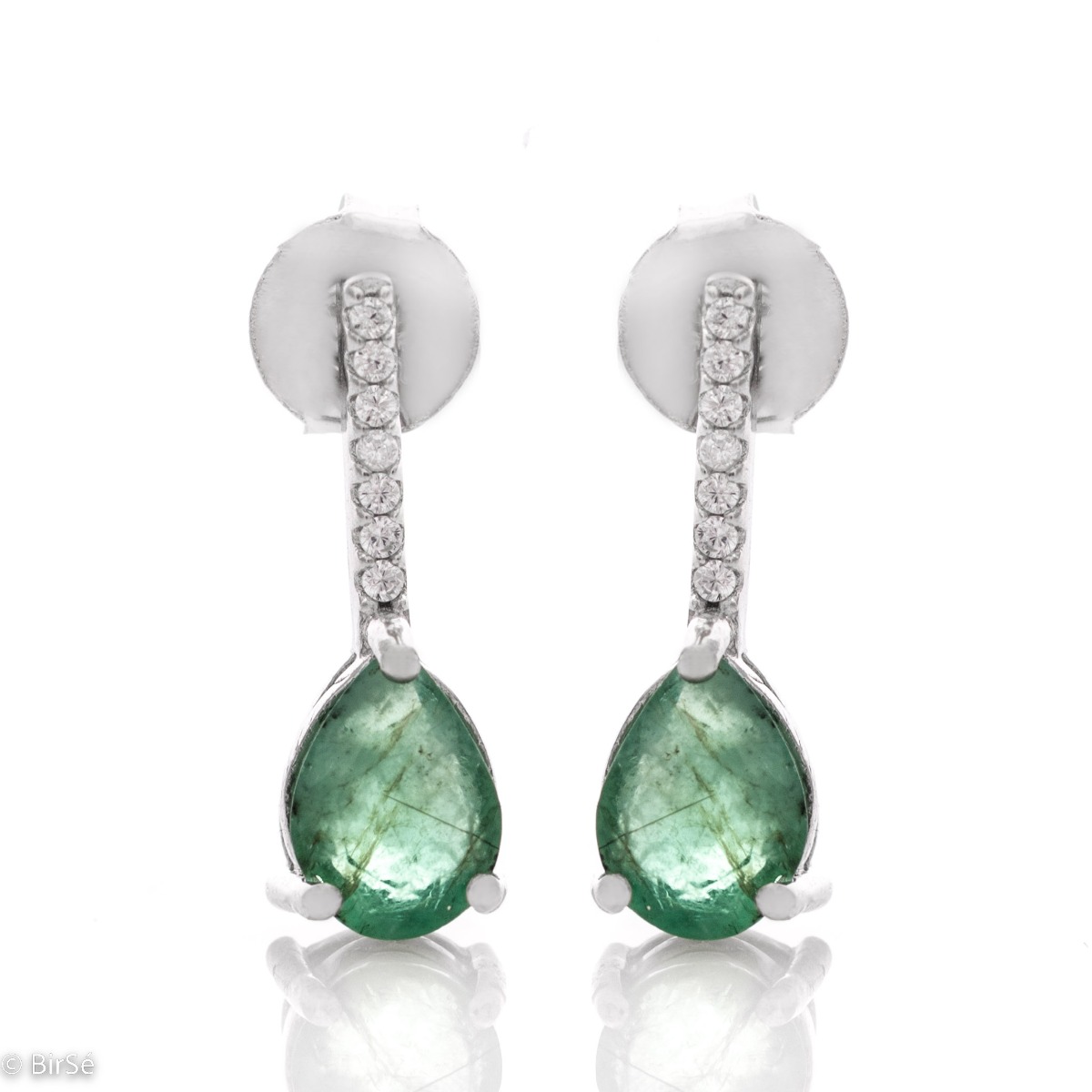 Exquisite women's earrings with a spectacular and radiant combination of a natural emerald stone with fine shiny zircons and delicate workmanship entirely of rhodium-plated silver.