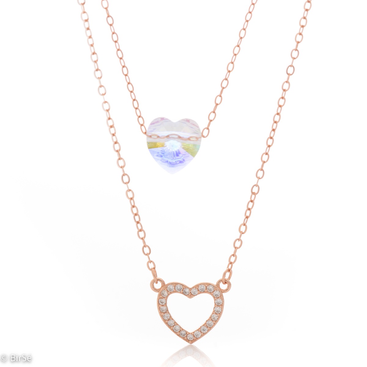 Elegant women's necklace with an exquisite design in rose silver with two delicate hearts. The jewelry has a double chain. A magnetic heart-shaped zircon dances charmingly on one, and on the second the heart is made of silver with added fine stones.