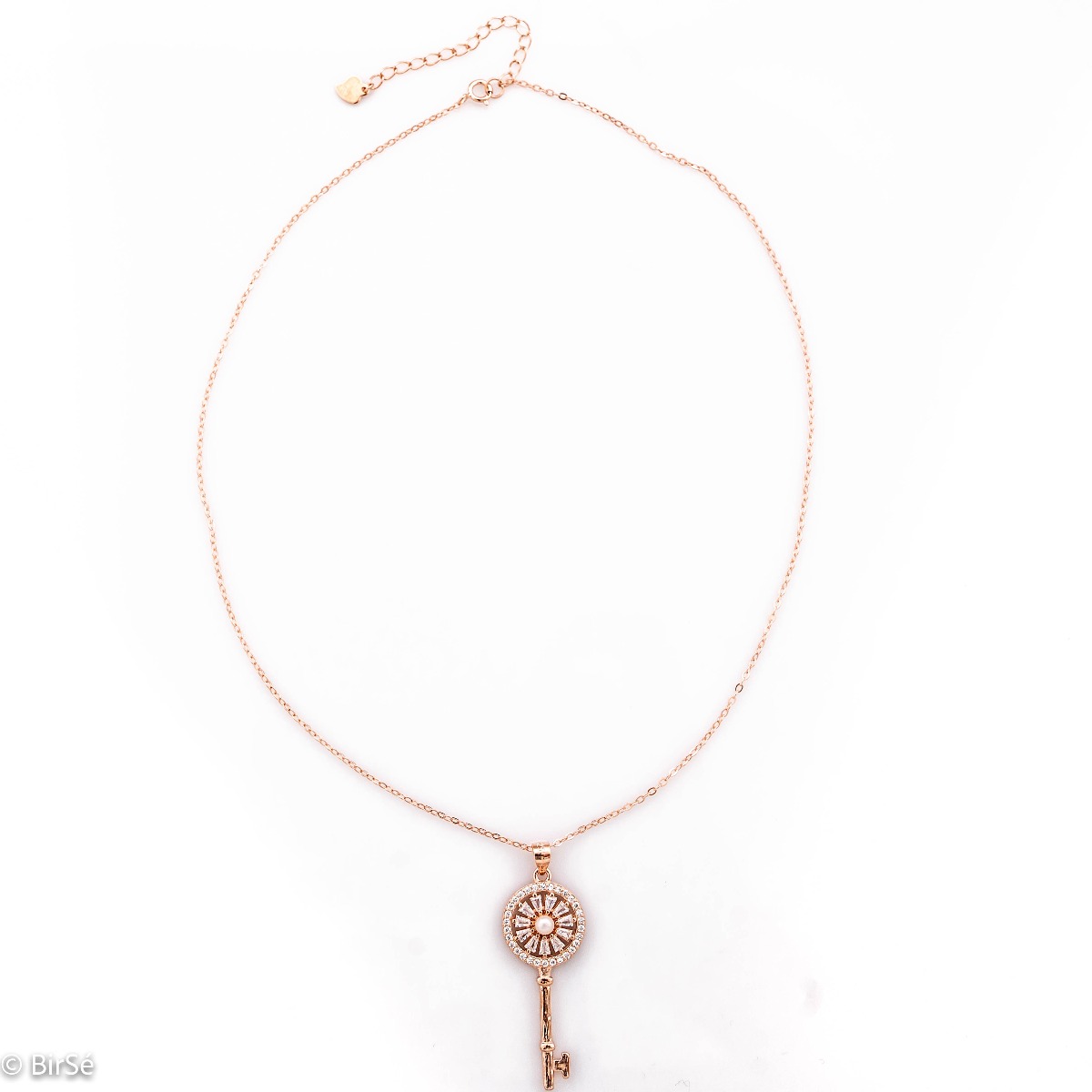 Charming beautiful women's key pendant necklace, masterfully crafted entirely in rose silver and zircons, varying in size and shape. A lovely piece of jewellery, a suitable gift for any occasion.