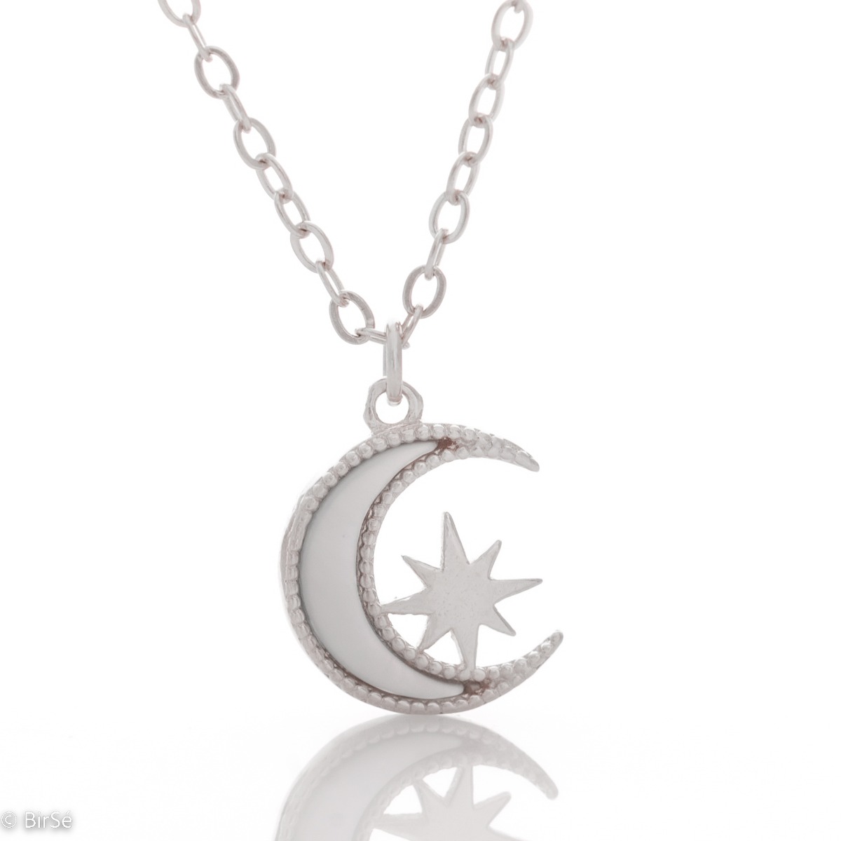 Elegant women's necklace with an exquisite design of rhodium-plated silver. The jewelry is of unique craftsmanship - a gentle moon, charmingly shining in the company of a glittering star.