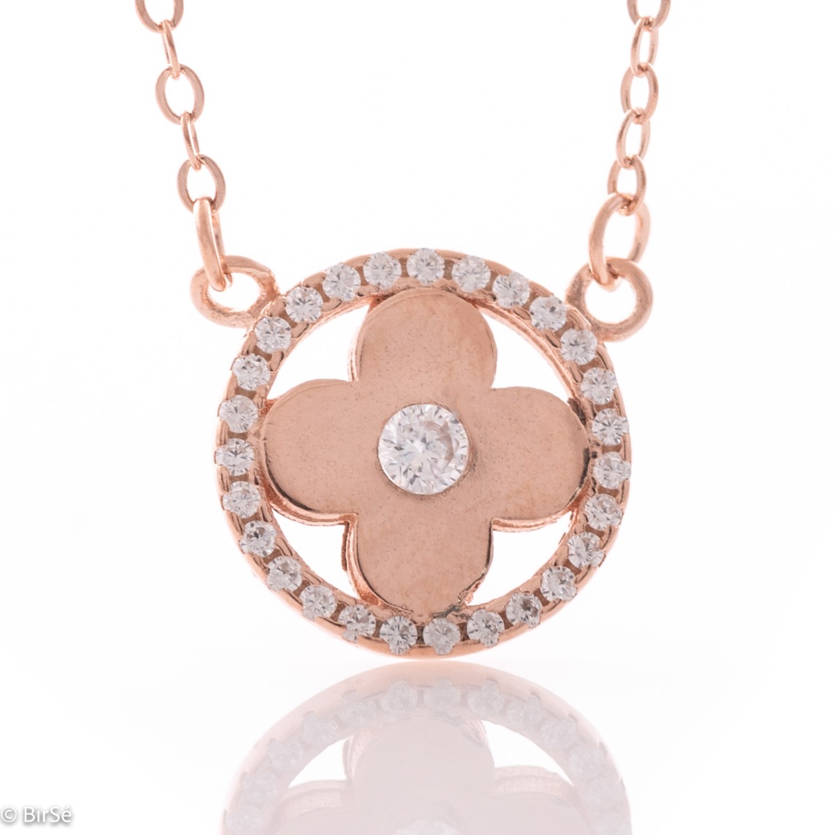 Delicate women's necklace with an exquisitely beautiful flower, made entirely of rose silver and placed in the middle of a silver ring encrusted with sparkling zircons.