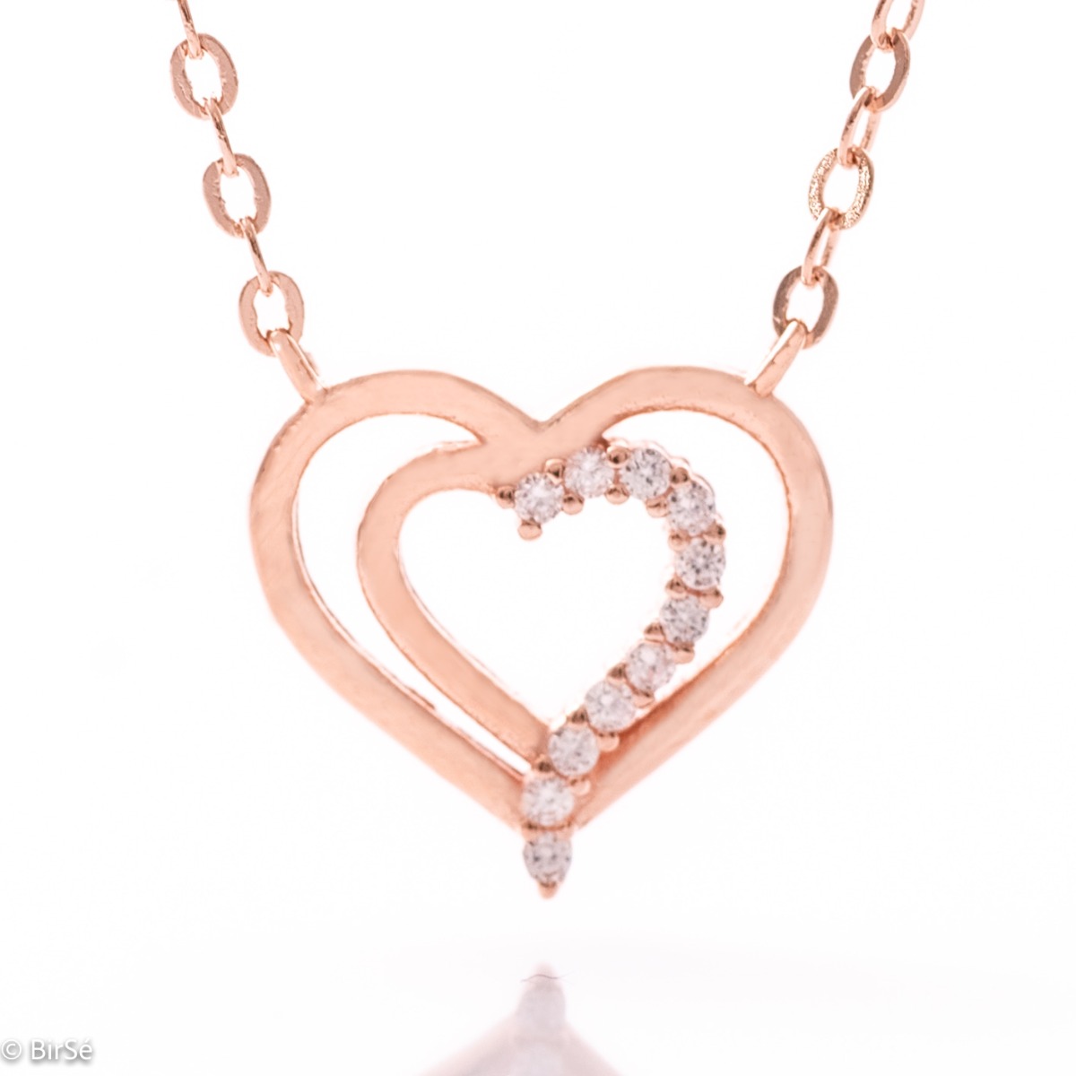 A delicate rhodium-plated rose silver heart-shaped necklace for women, elegantly sculpted and decorated with sparkling zircons.