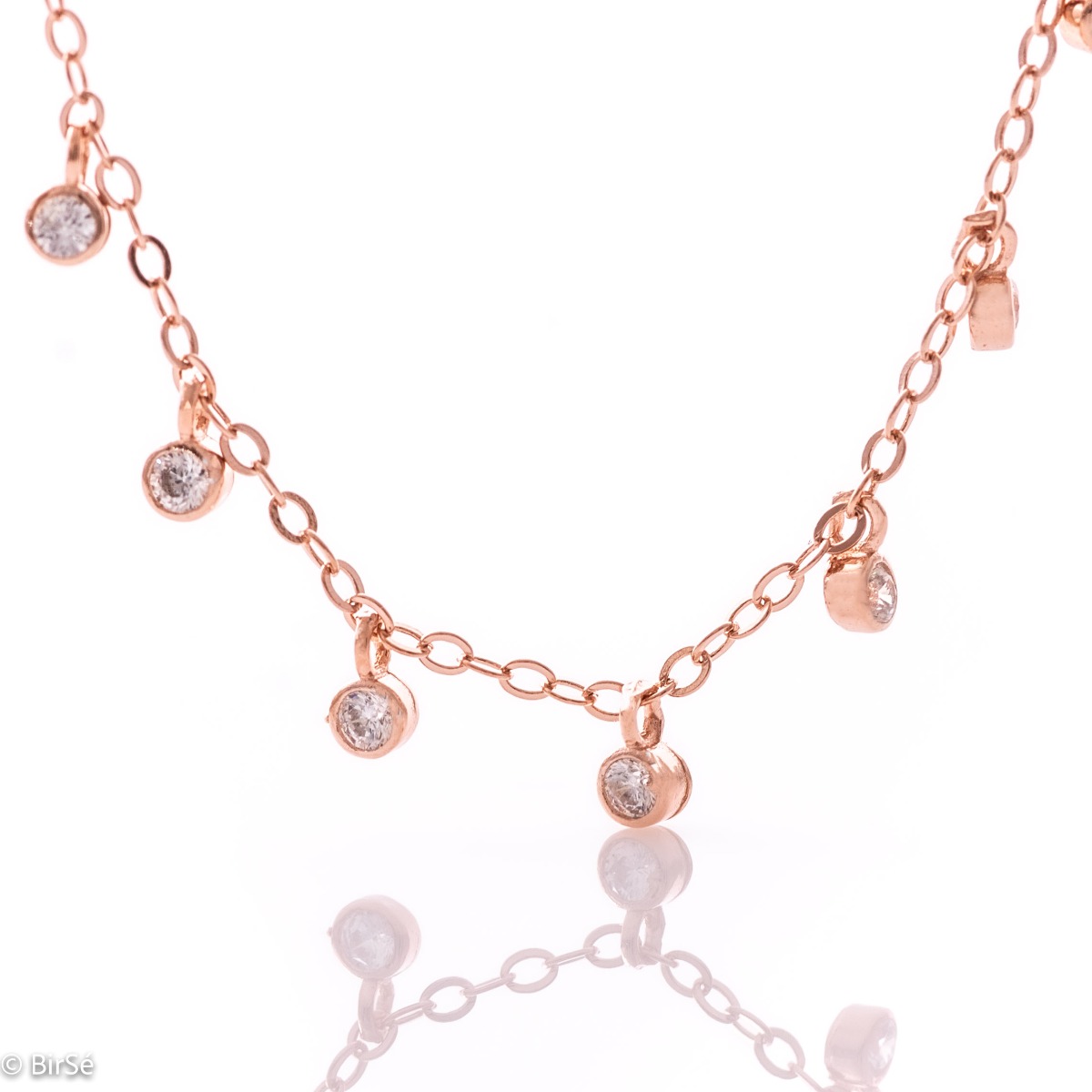 Stylish women's necklace in fine rose silver with pendants of sparkling zircons. The model is suitable for both formal events in your life and everyday life.