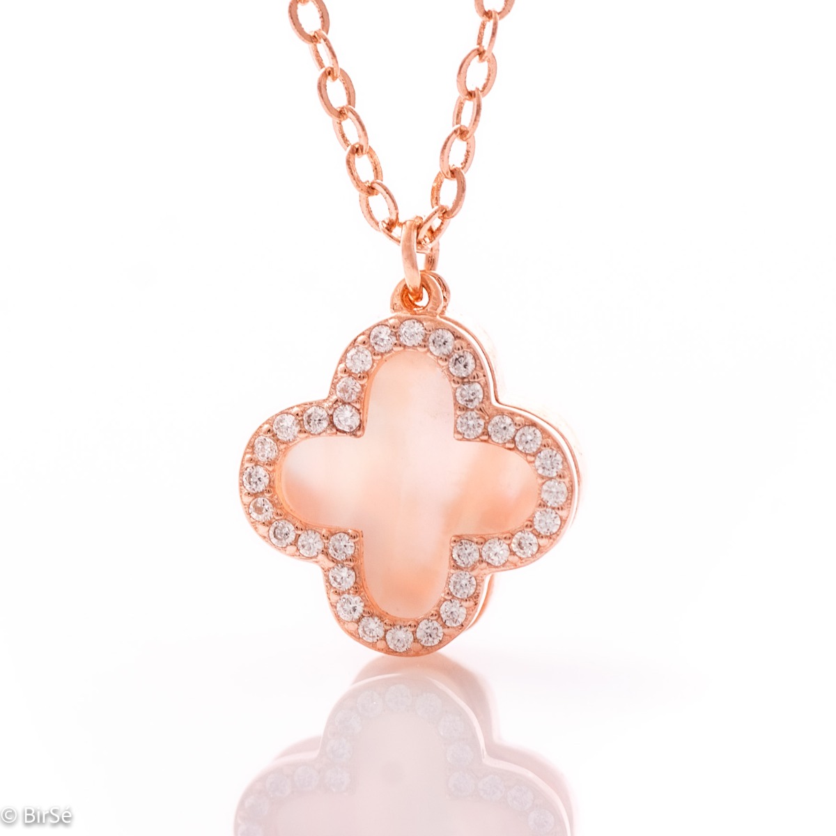 Exquisite clover necklace made of rose silver with masterful craftsmanship of the elements in combination with mother of pearl and zircons. Can be teamed with matching clover earrings.