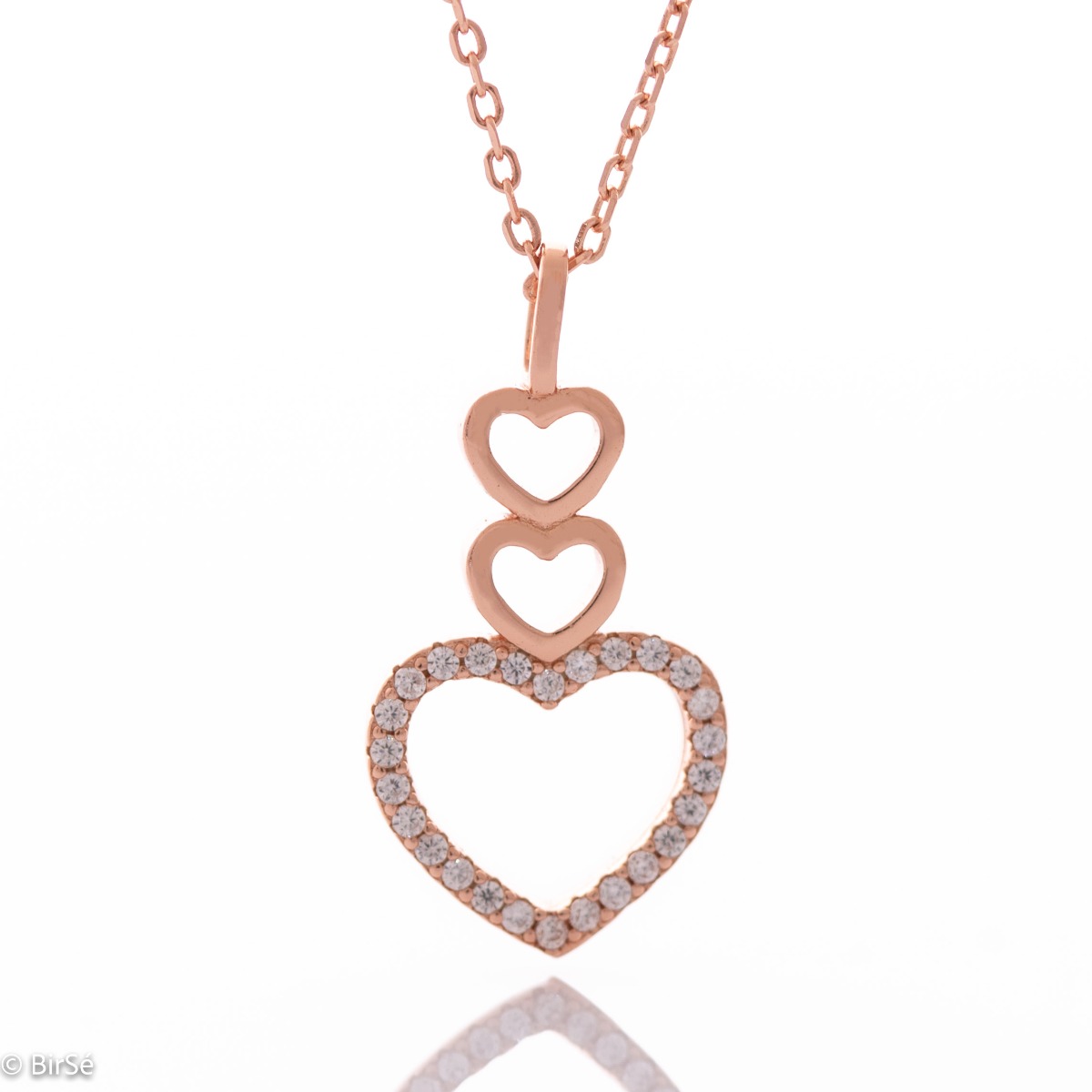 An elegant women's necklace with a column of three fine hearts, made entirely of soft rhodium-plated silver, complemented by the shine of white zircons.